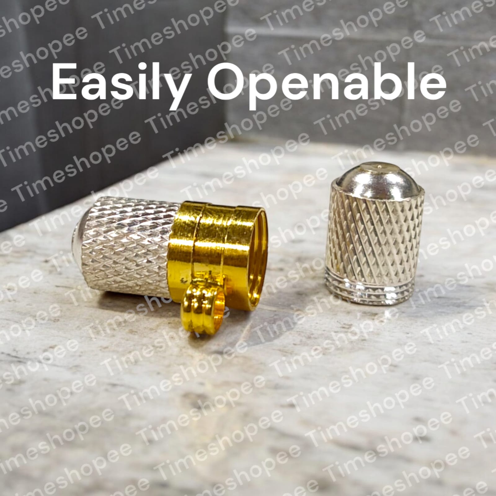 Brass and silver taweezes with Bhojpatra sheet, displayed elegantly on a neutral background