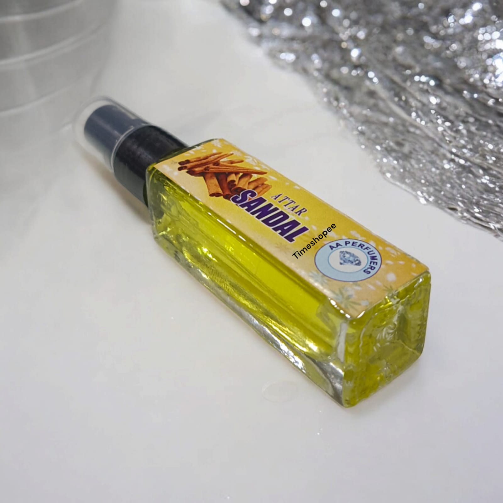 Chandan Spray Attar bottle with 25ML capacity, offering a natural sandalwood scent, 0% alcohol for Shiv Ji worship.