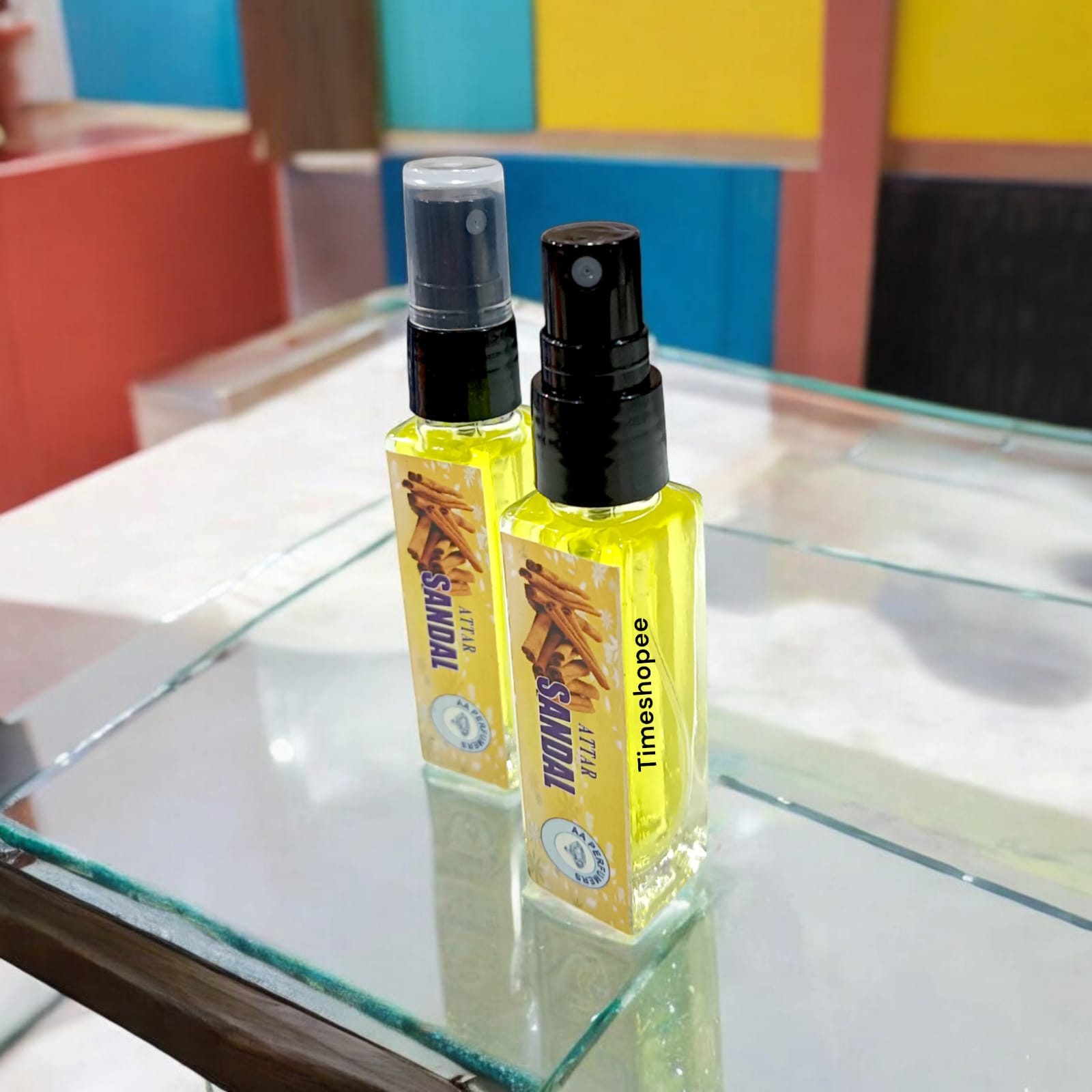 Chandan Spray Attar bottle with 25ML capacity, offering a natural sandalwood scent, 0% alcohol for Shiv Ji worship.