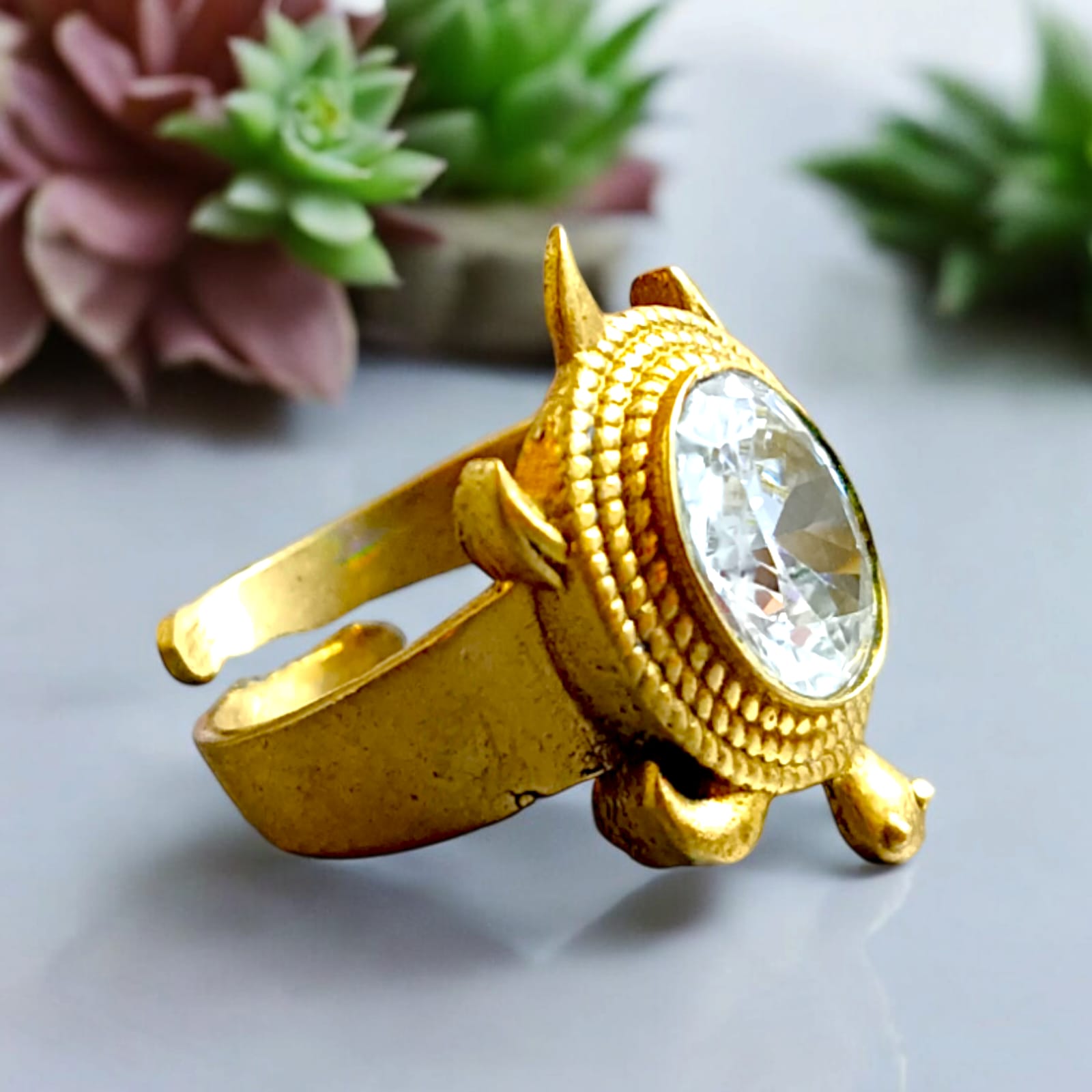 Close-up image of the Kachua Diamond Ring, featuring a diamond set in a tortoise-shaped design made from Ashtdhatu. The ring is adjustable, with intricate detailing suitable for both men and women.