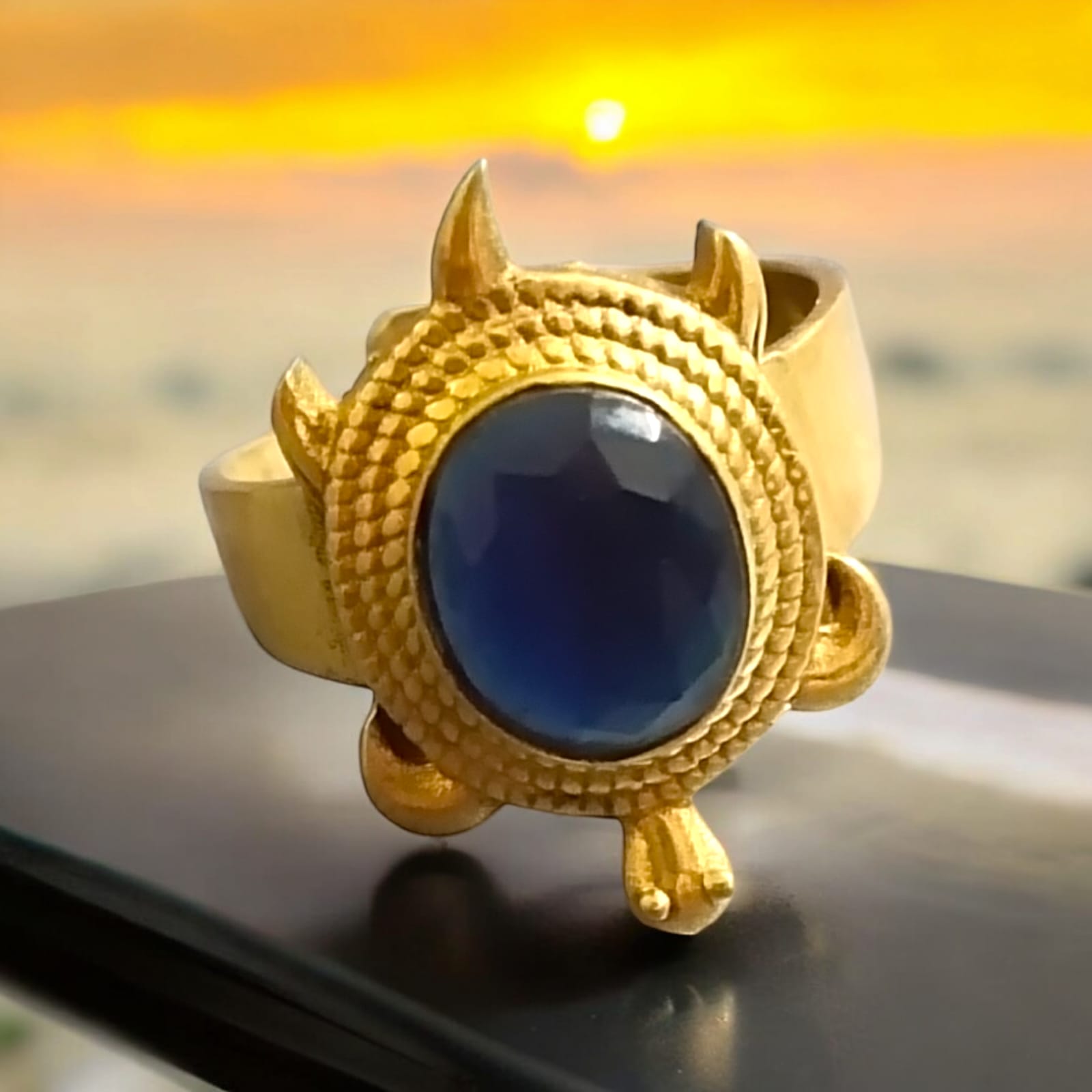 Close-up image of the Kachua Neelam Ring, showcasing a deep blue Neelam gemstone set in a tortoise-shaped design, made from Ashtdhatu. The ring is adjustable and suitable for men and women.