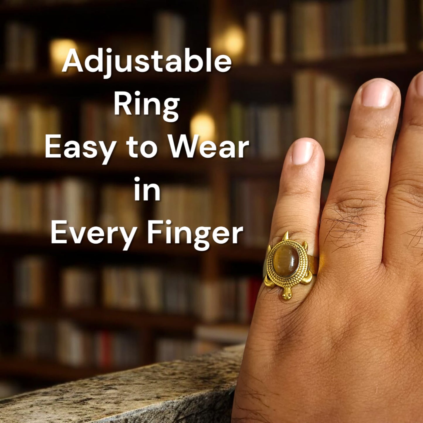 Close-up image of the Kachua Tiger Eye Ring, featuring a brown and gold Tiger Eye gemstone set in a tortoise-shaped design, made from Ashtdhatu. The ring is adjustable and unisex.