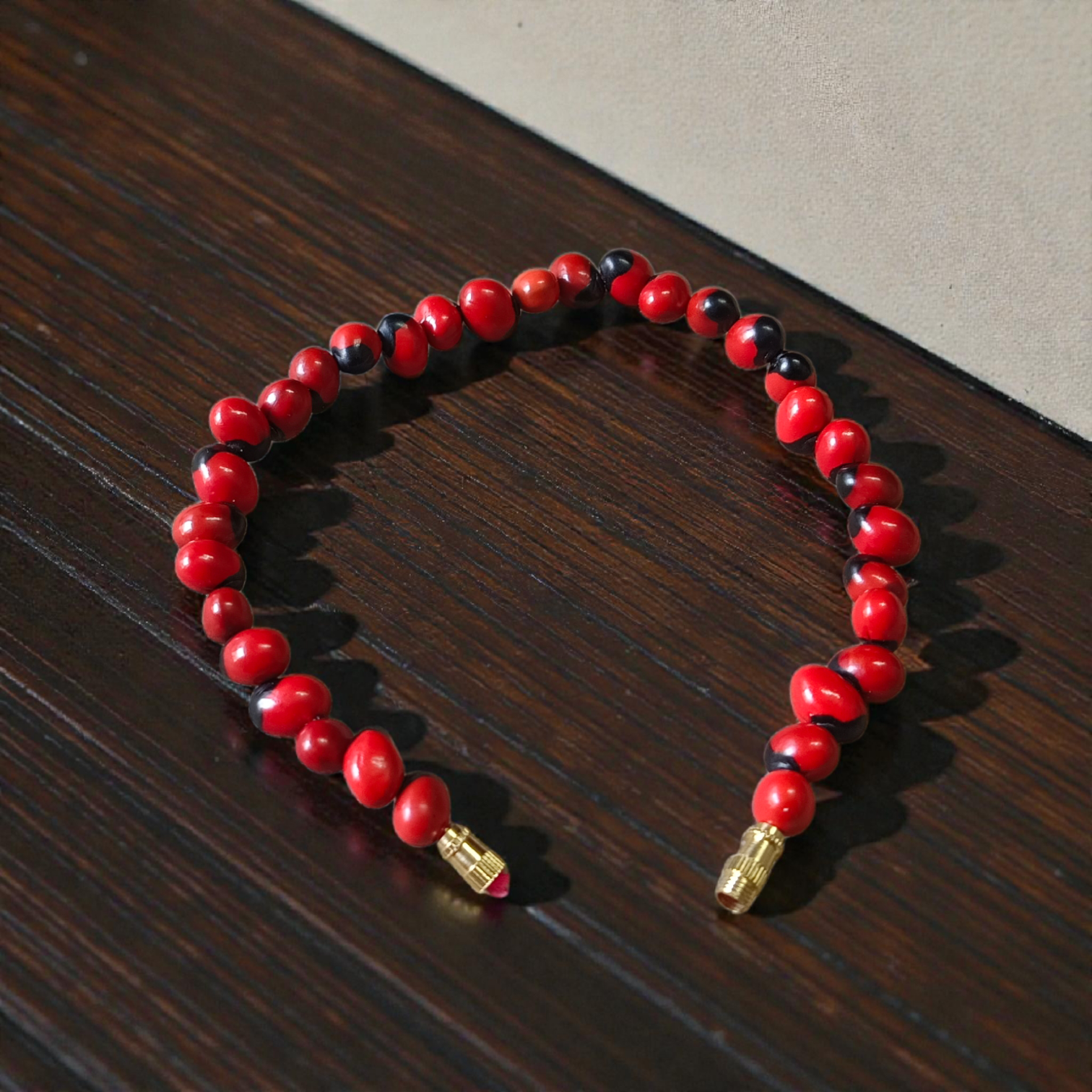 Combo of Black Gunja Bracelet and Red Gunja Bracelet with lab-certified natural beads, stretchable design for protection and energy