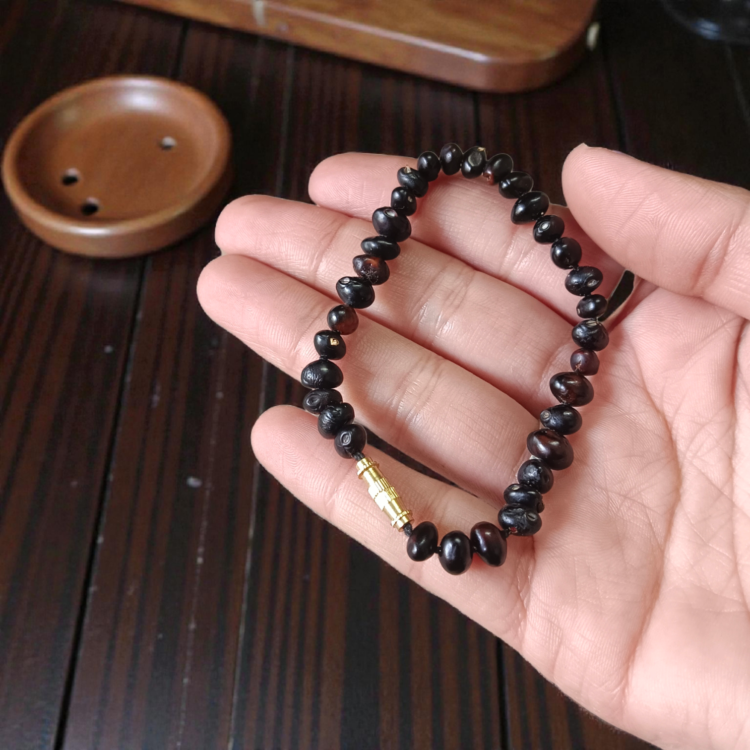 Combo of Black Gunja Bracelet and Red Gunja Bracelet with lab-certified natural beads, stretchable design for protection and energy