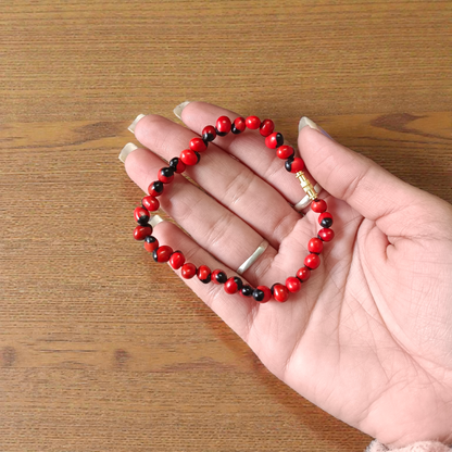 Combo of Black Gunja Bracelet and Red Gunja Bracelet with lab-certified natural beads, stretchable design for protection and energy