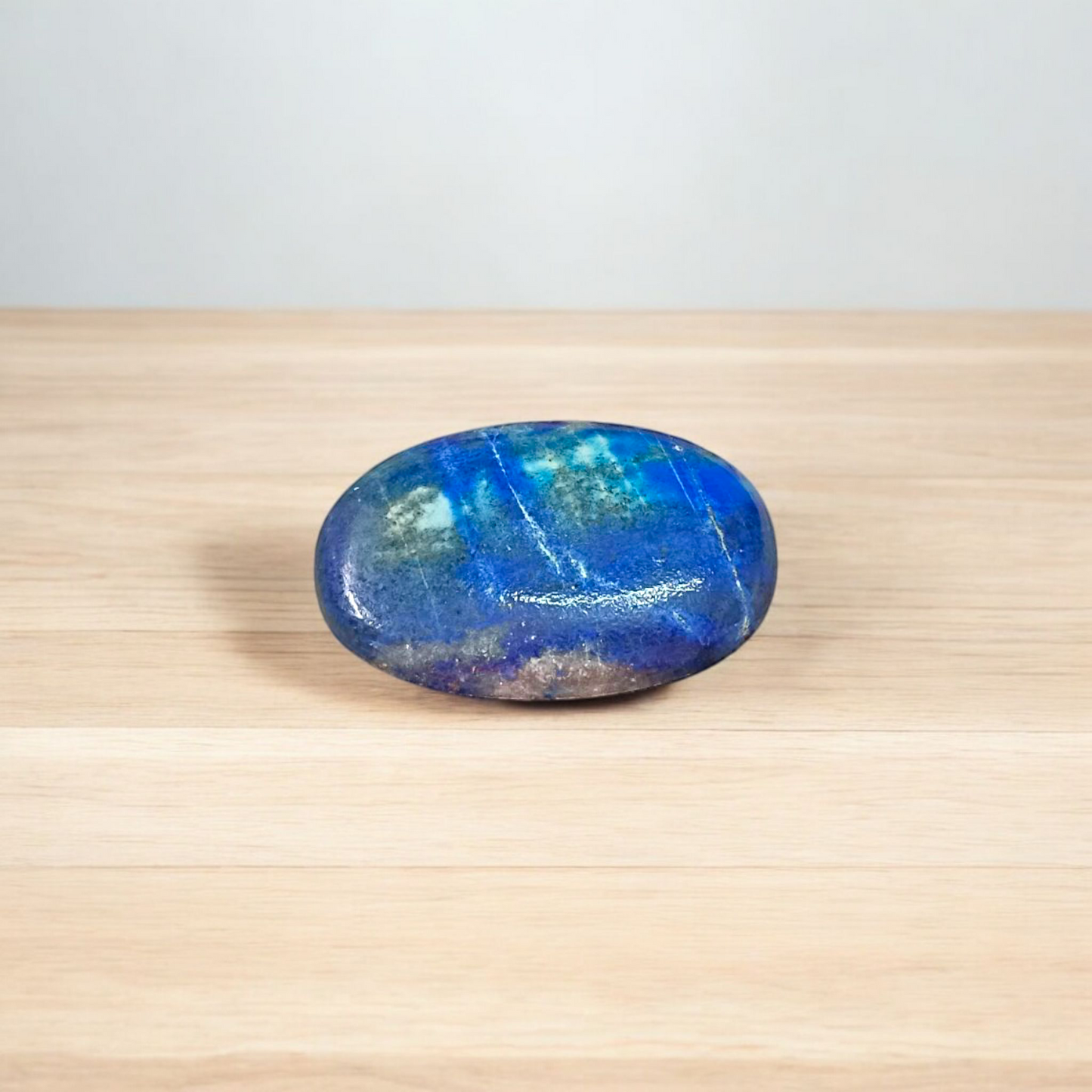 Deep blue Lapis Lazuli stone with golden flecks, used for mental clarity and emotional healing