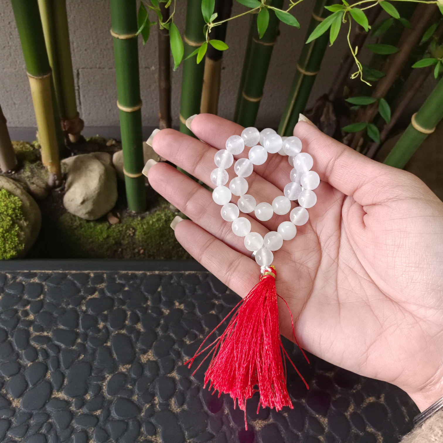 High-quality Crystal (Sphatik) Mala with 108+1 transparent 8MM beads, ideal for meditation and spiritual healing, displayed on a white background