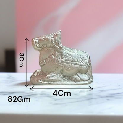 Image of a Natural Parad Nandi Idol made from mercury alloy, placed on a clean surface, reflecting divine and traditional craftsmanship