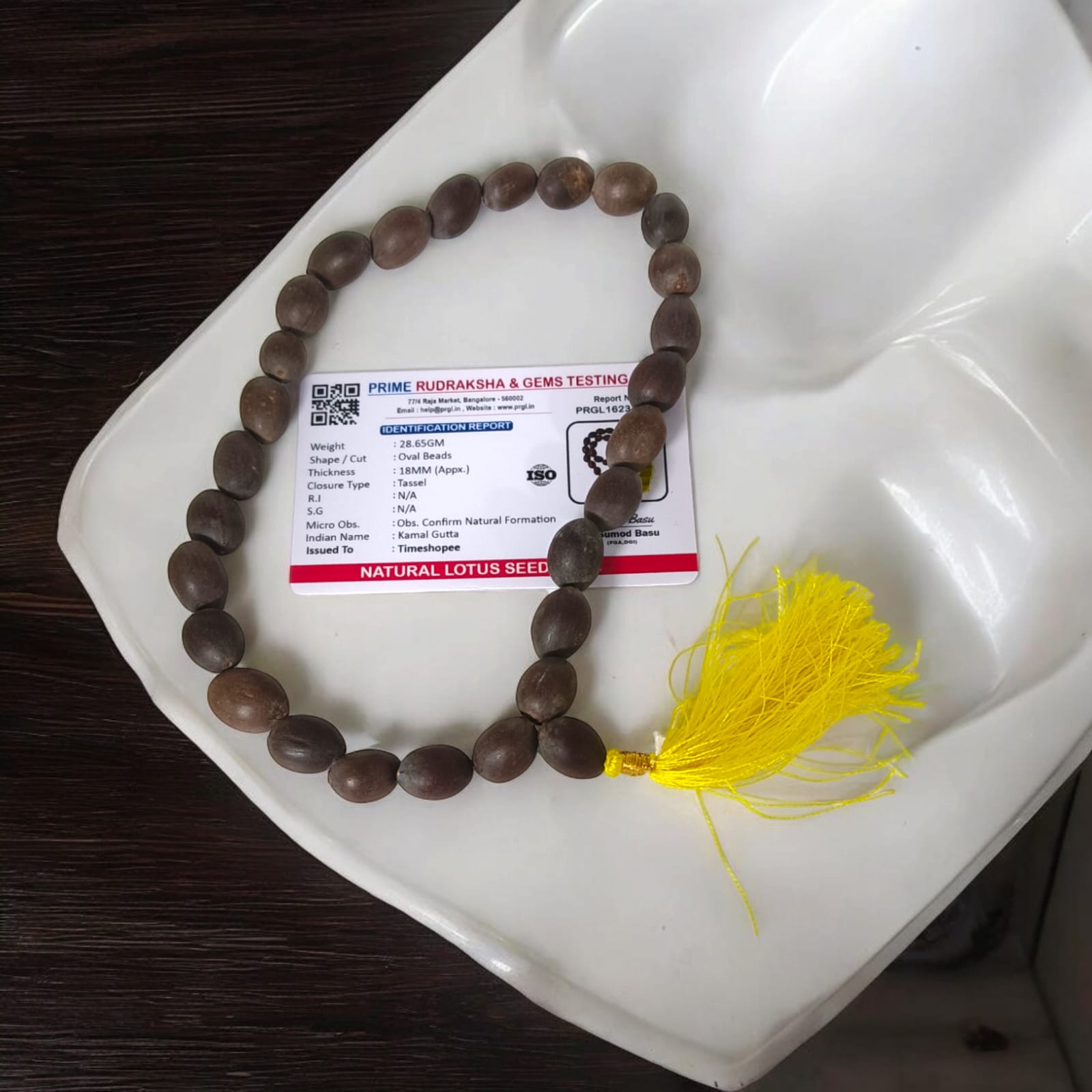 Kamal Gutta Mala made from lab-certified lotus seeds, featuring 27+1 beads, suitable for chanting mantras in car, office, or while traveling.