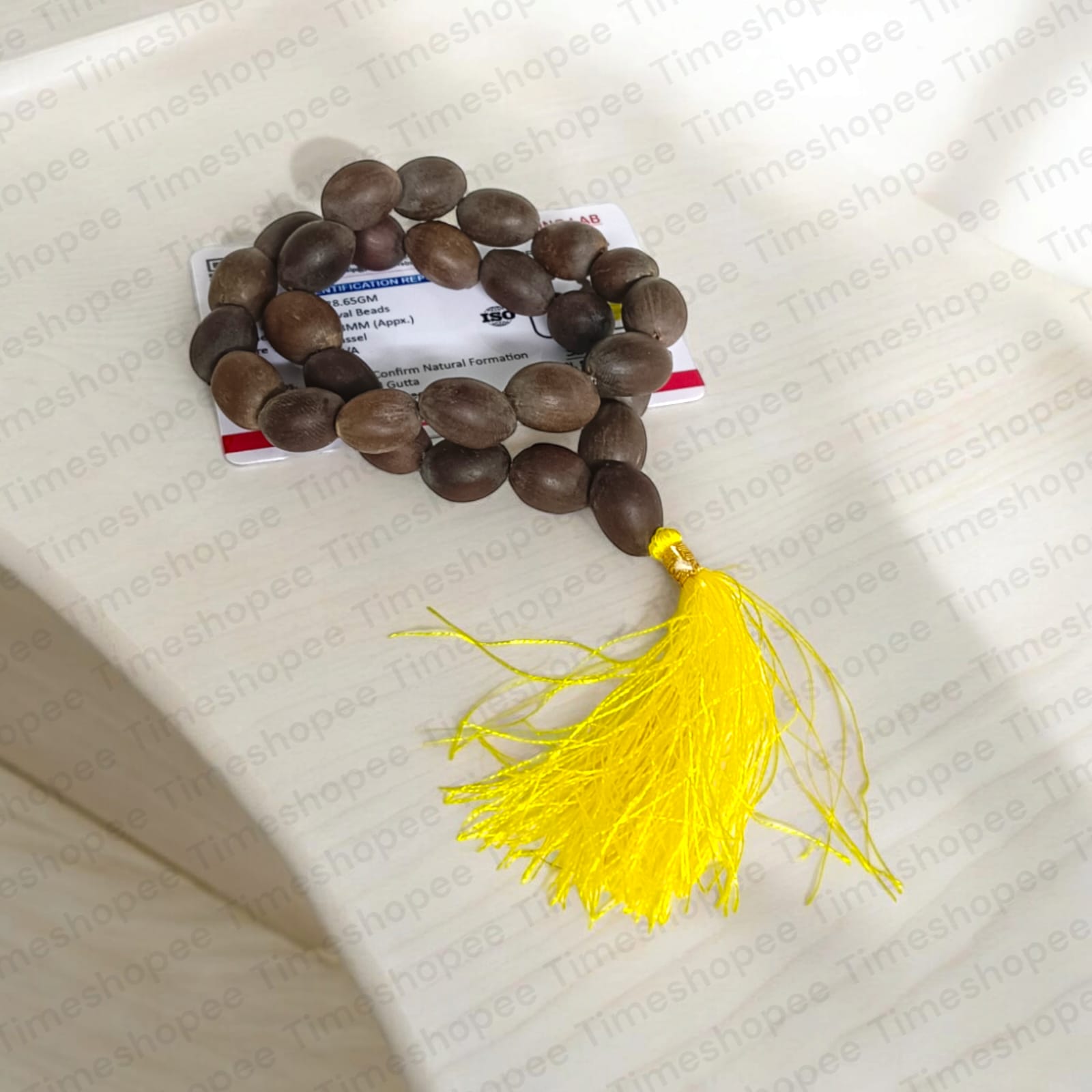Kamal Gutta Mala made from lab-certified lotus seeds, featuring 27+1 beads, suitable for chanting mantras in car, office, or while traveling.