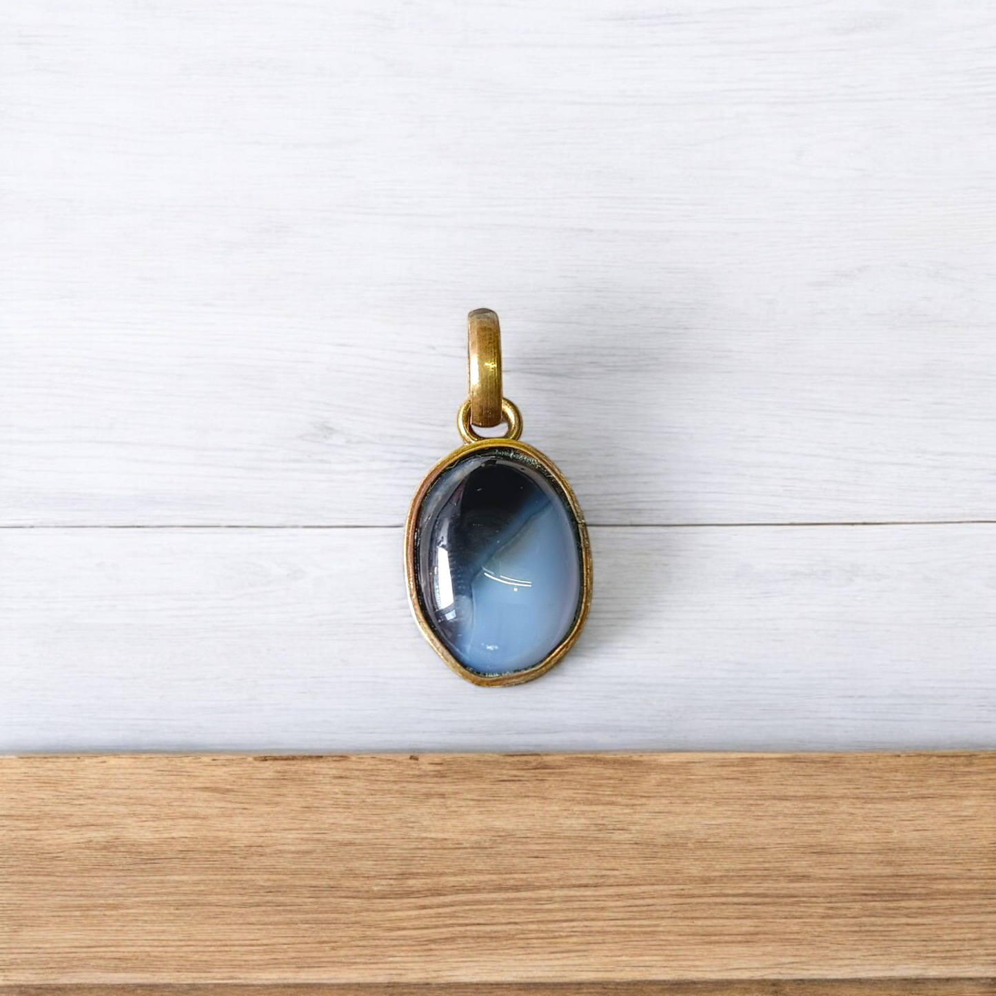 Lab-certified Black Sulemani Hakik gemstone pendant with black thread, known for protection and grounding benefits