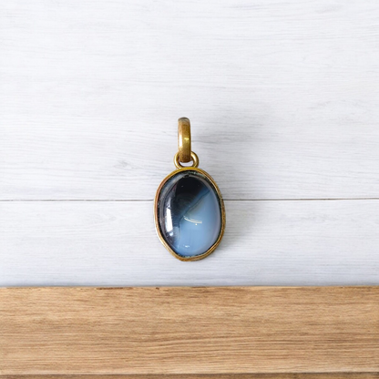 Lab-certified Black Sulemani Hakik gemstone pendant with black thread, known for protection and grounding benefits