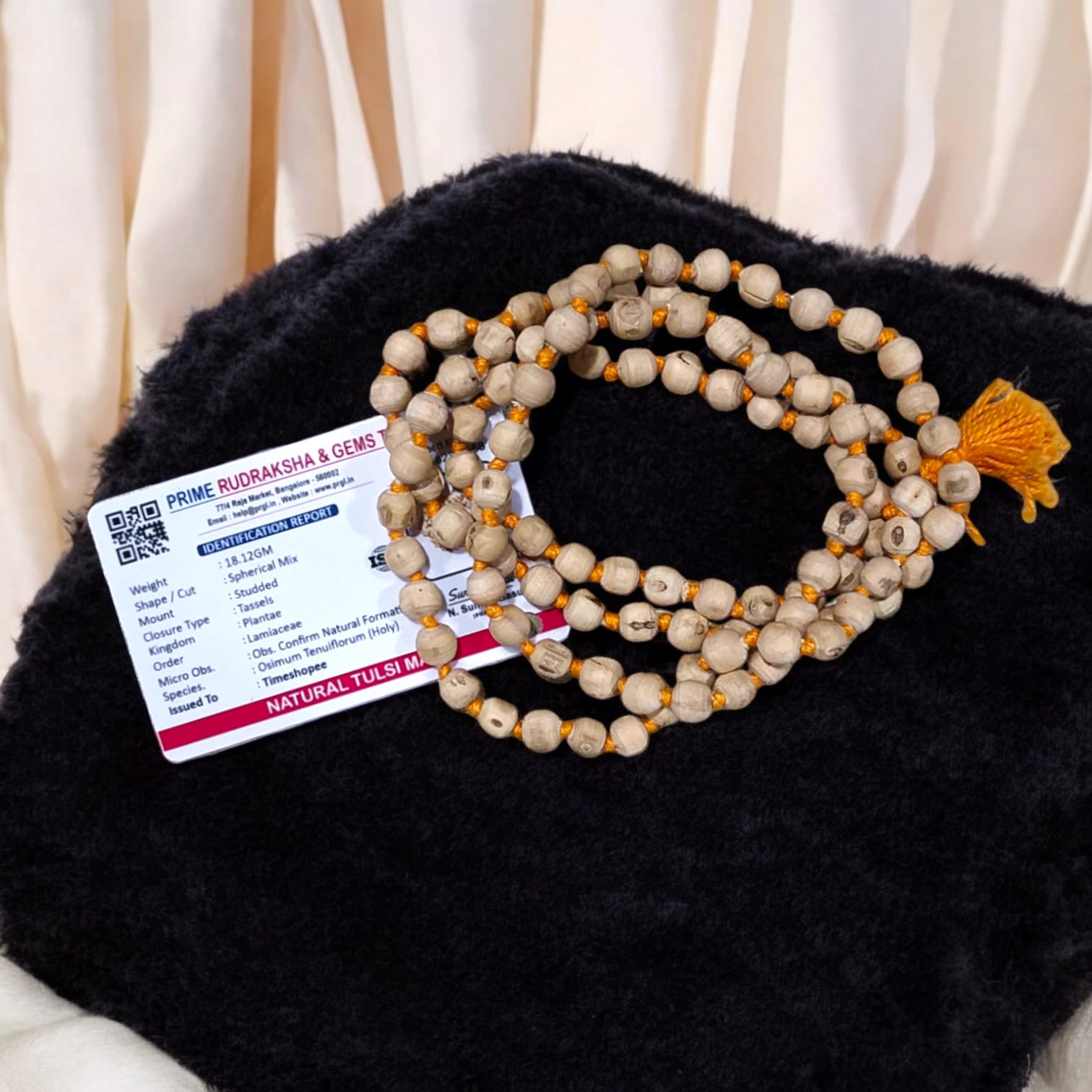 Lab-certified Tulsi Mala with 108+1 beads, used for meditation and spiritual practices, featuring traditional and sacred Tulsi beads.