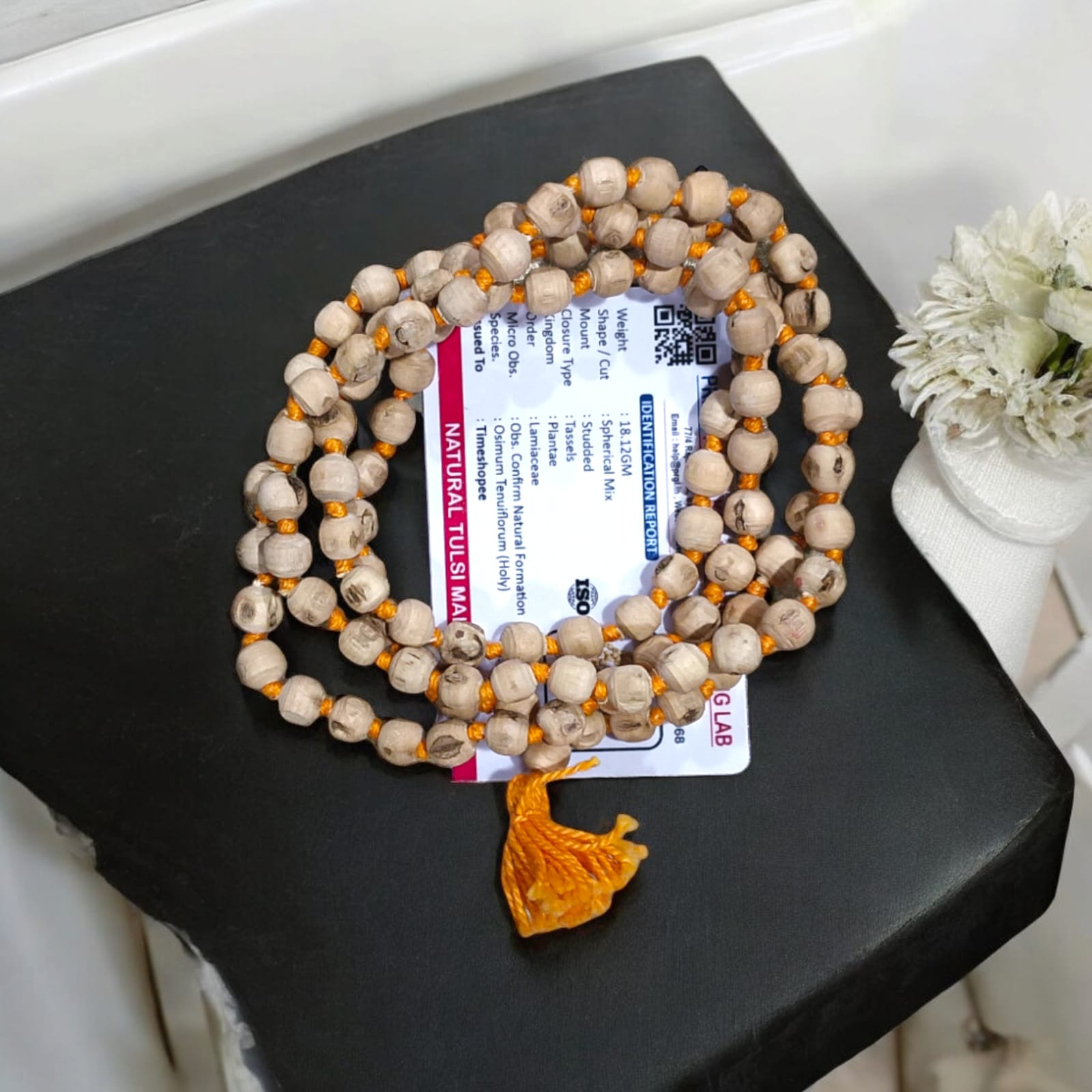 Lab-certified Tulsi Mala with 108+1 beads, used for meditation and spiritual practices, featuring traditional and sacred Tulsi beads.