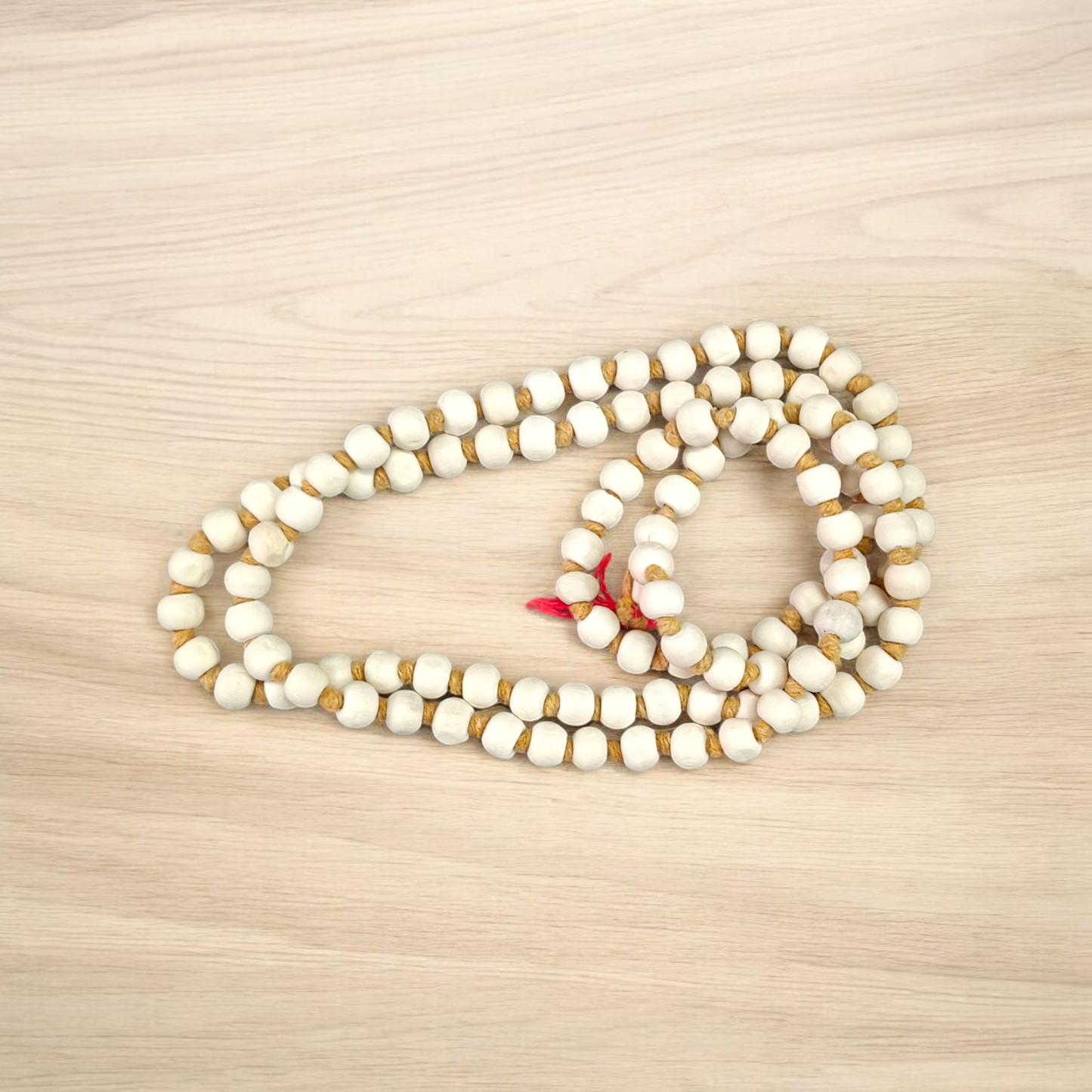 Lab-certified Tulsi Mala with 108+1 beads, used for meditation and spiritual practices, featuring traditional and sacred Tulsi beads