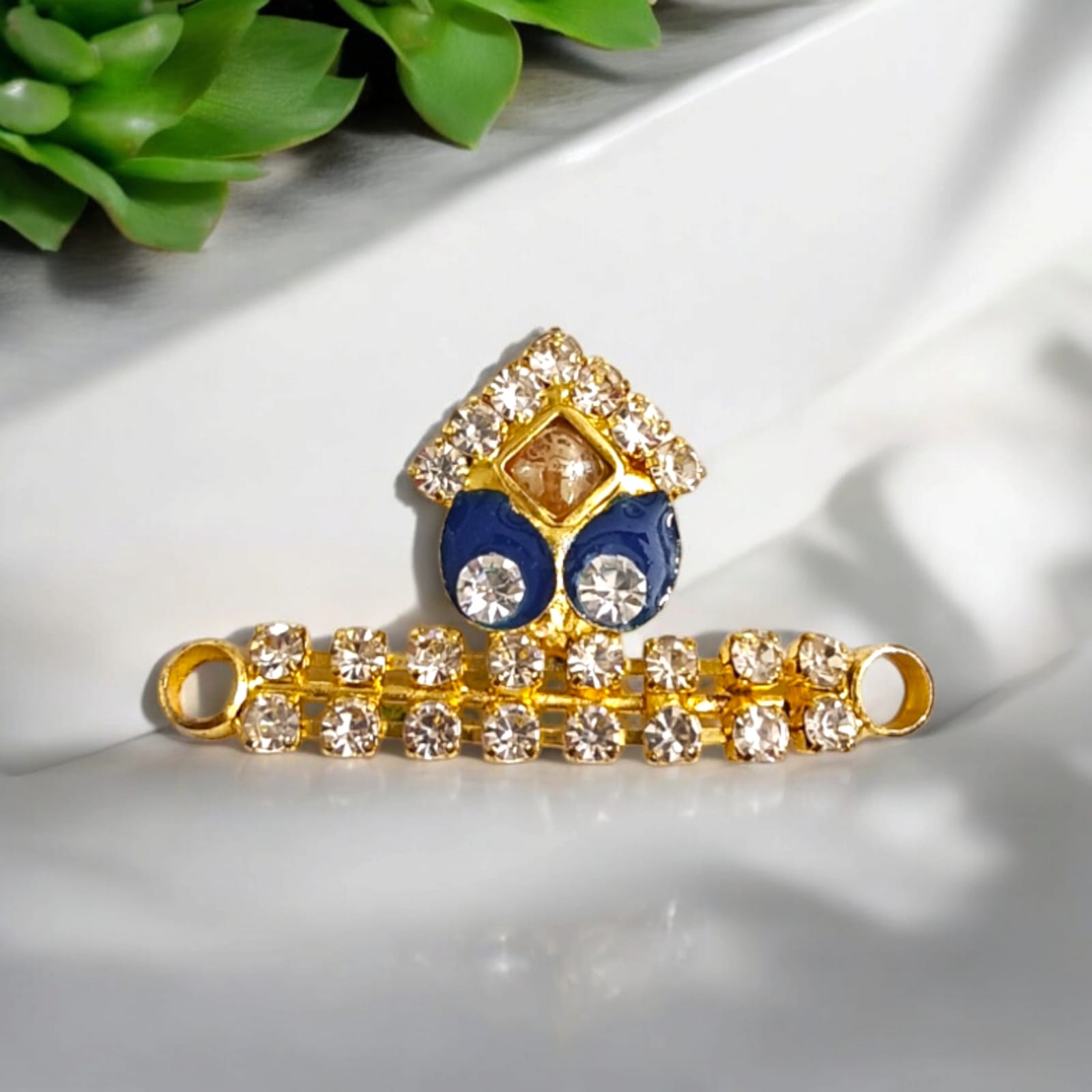 Laddu Gopal Mukut in Parrot Green, Dark Green, Bright Pink, Mehroon, and Navy Blue with an adjustable design by Timeshopee