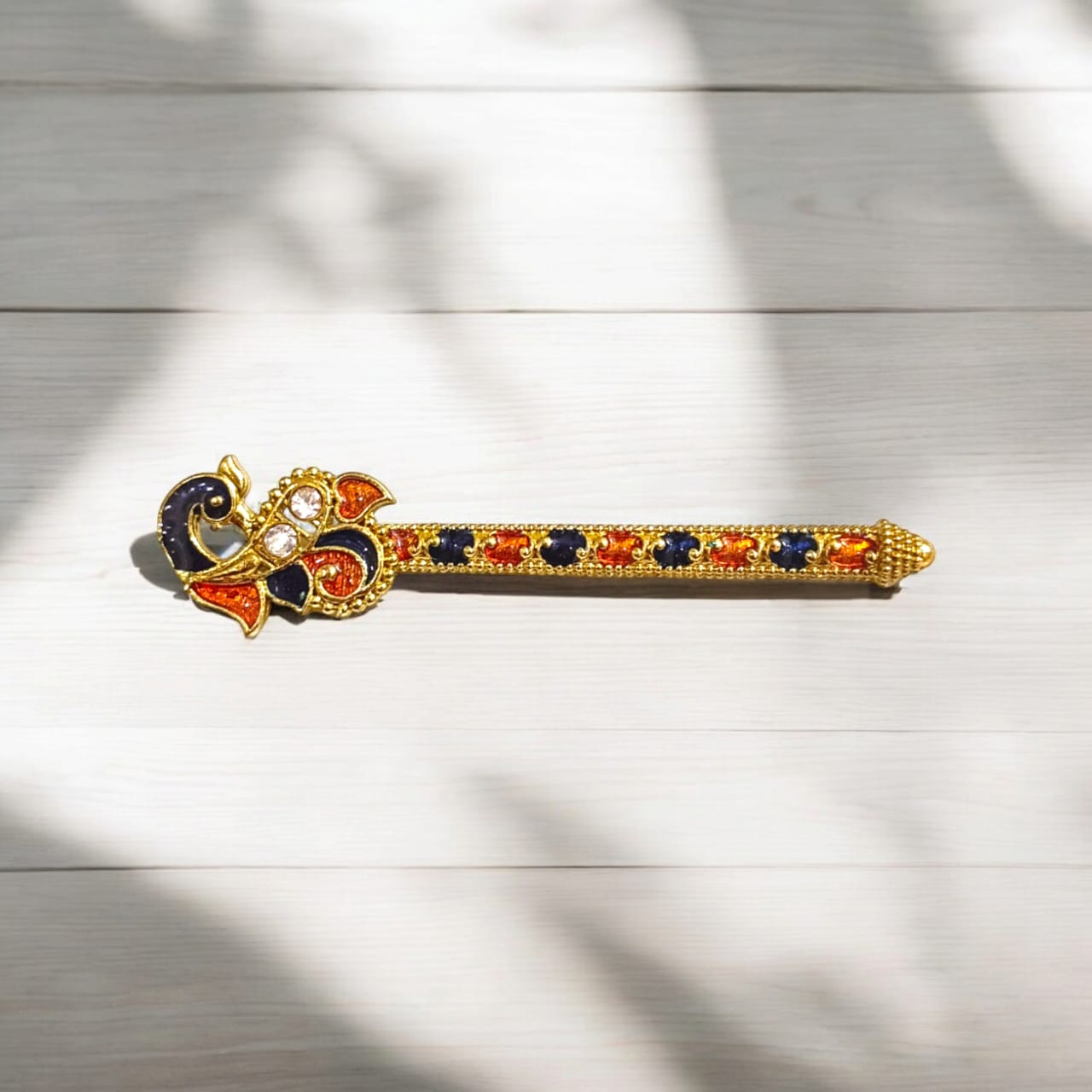 Laddu Gopal bansuri with peacock feather design, a unique and beautifully crafted flute accessory for Bal Gopal idols.