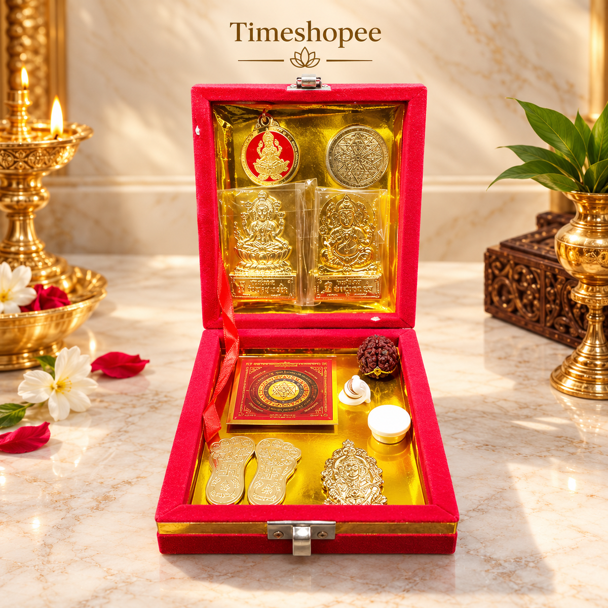 Lakshmi Kuber Box with various pooja items including idols, coins, yantra, and more, organized in a designed wooden box from Timeshopee
