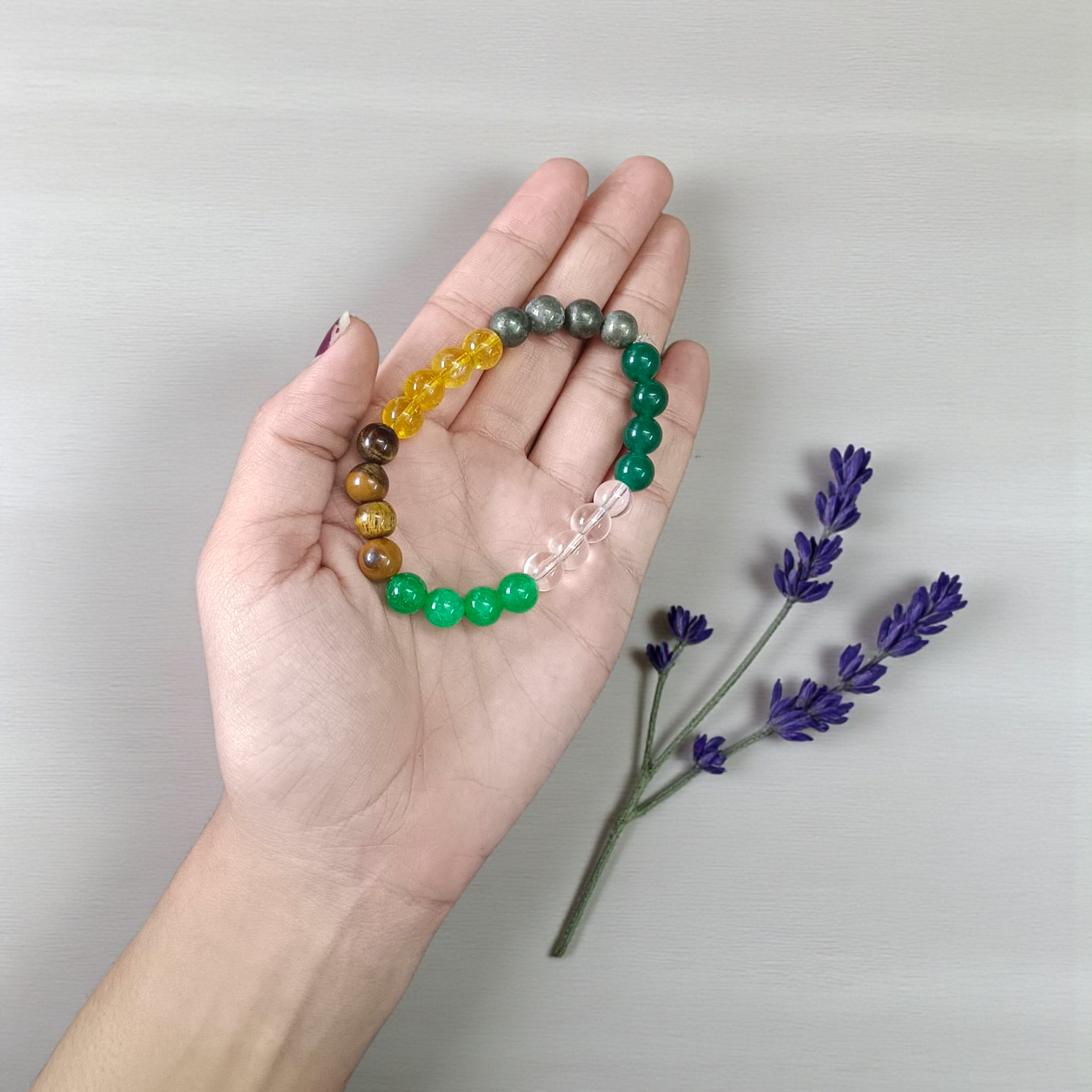 Money Magnet Bracelet with 8mm lab-certified magnetic beads and stretchable design, ideal for attracting wealth, opportunities, and financial growth