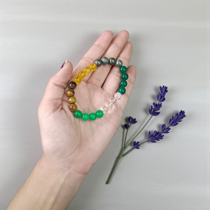 Money Magnet Bracelet with 8mm lab-certified magnetic beads and stretchable design, ideal for attracting wealth, opportunities, and financial growth