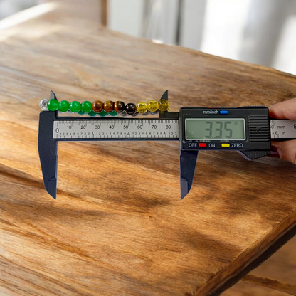 Money Magnet Bracelet with 8mm lab-certified magnetic beads and stretchable design, ideal for attracting wealth, opportunities, and financial growth