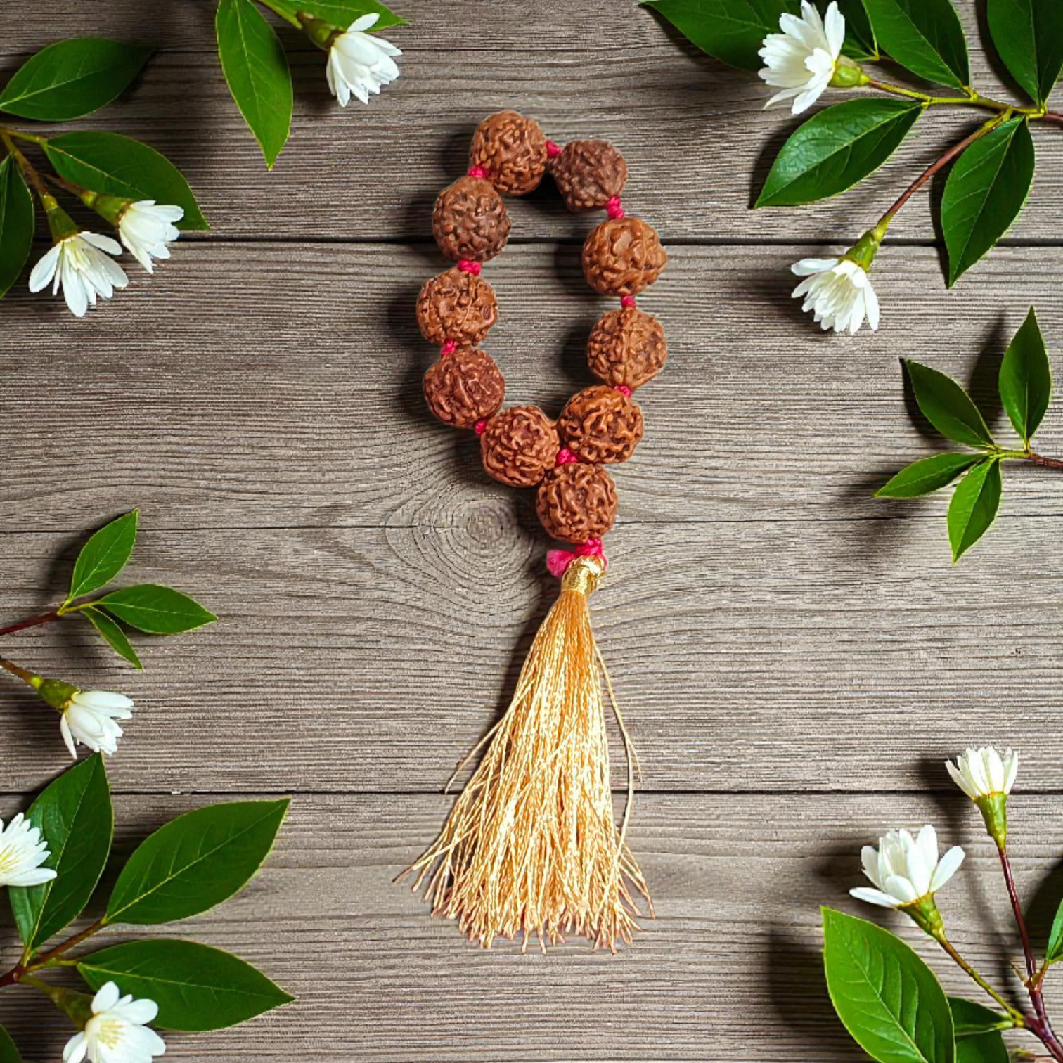 Natural 5 Mukhi Rudraksha Finger Mala with 9+1 round brown beads (8mm), used for meditation, chanting, and healing practices