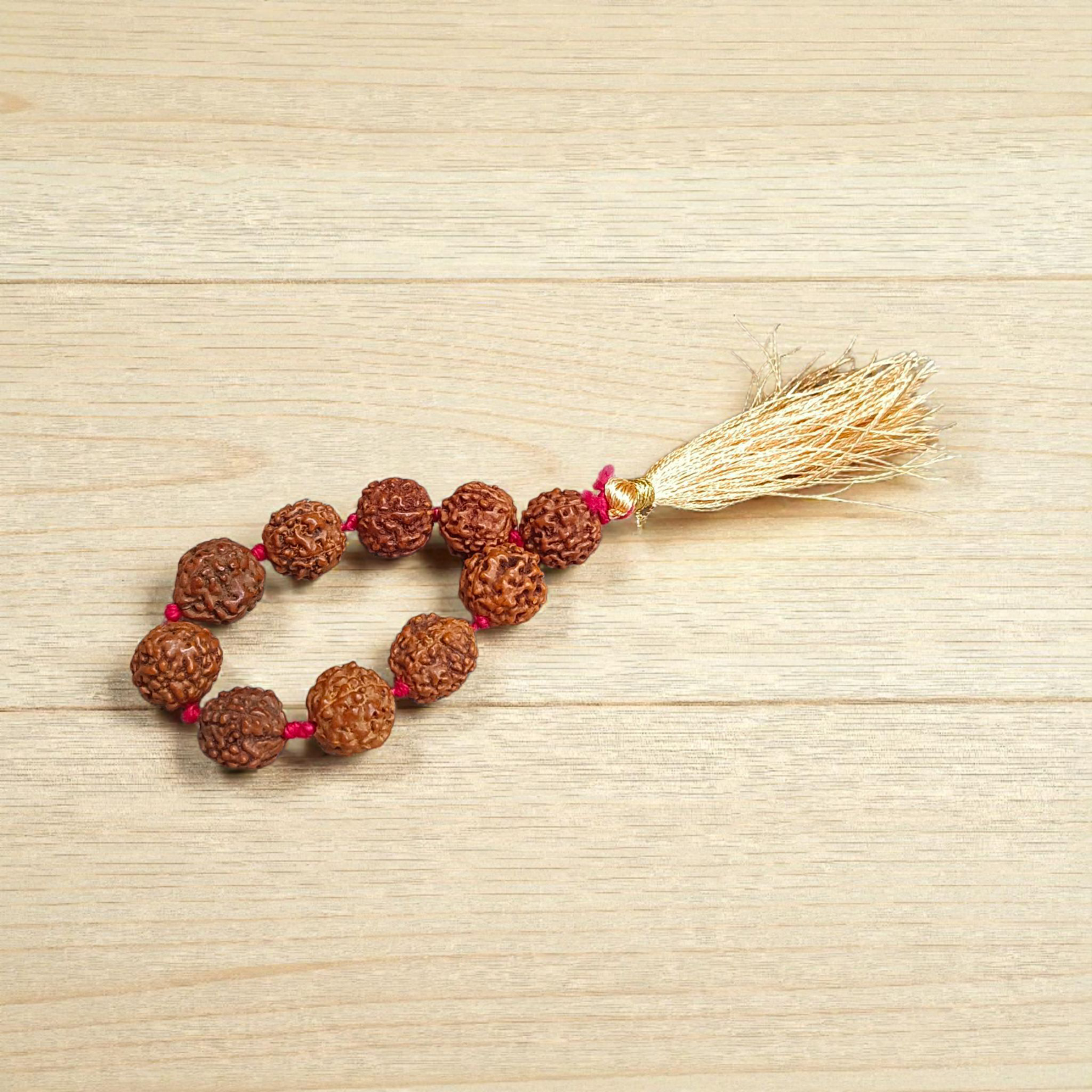 Natural 5 Mukhi Rudraksha Finger Mala with 9+1 round brown beads (8mm), used for meditation, chanting, and healing practices