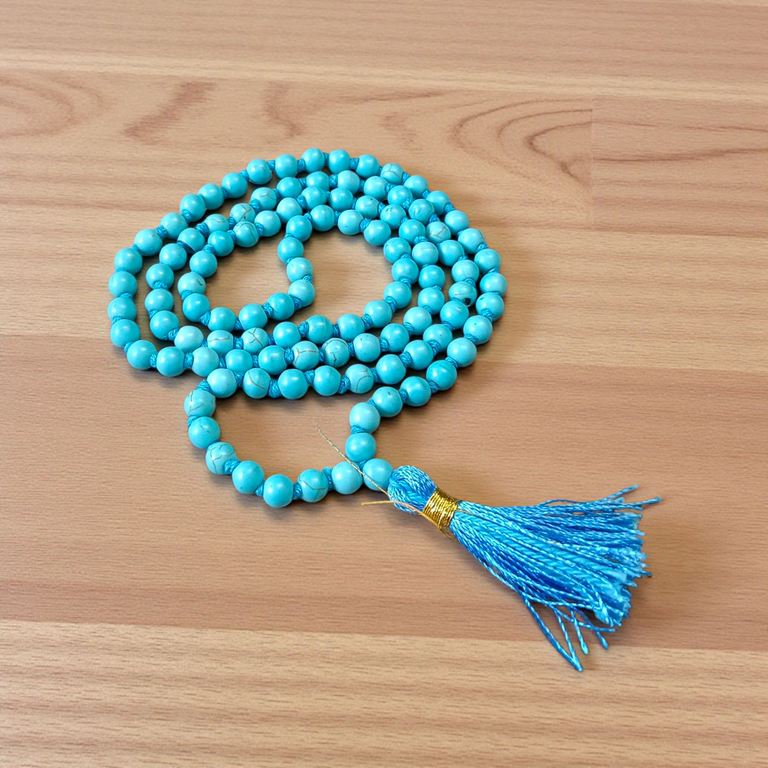 Natural Turquoise (Firoza) Mala with 108+1 round beads (6mm), used for meditation, healing, and spiritual protection