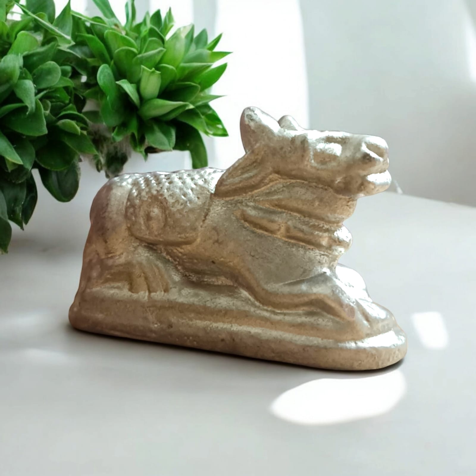 Parad Nandi Ji - 100% Genuine Mercury Nandi for Shivling, Lab Certified, from Timeshopee. A finely crafted mercury statue of Nandi, the sacred bull of Lord Shiva, designed to enhance spiritual devotion and energy around a Shivling.