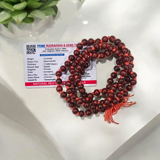 [Red Sandalwood Mala with 108 beads, handcrafted and lab-certified, placed on a white background]

