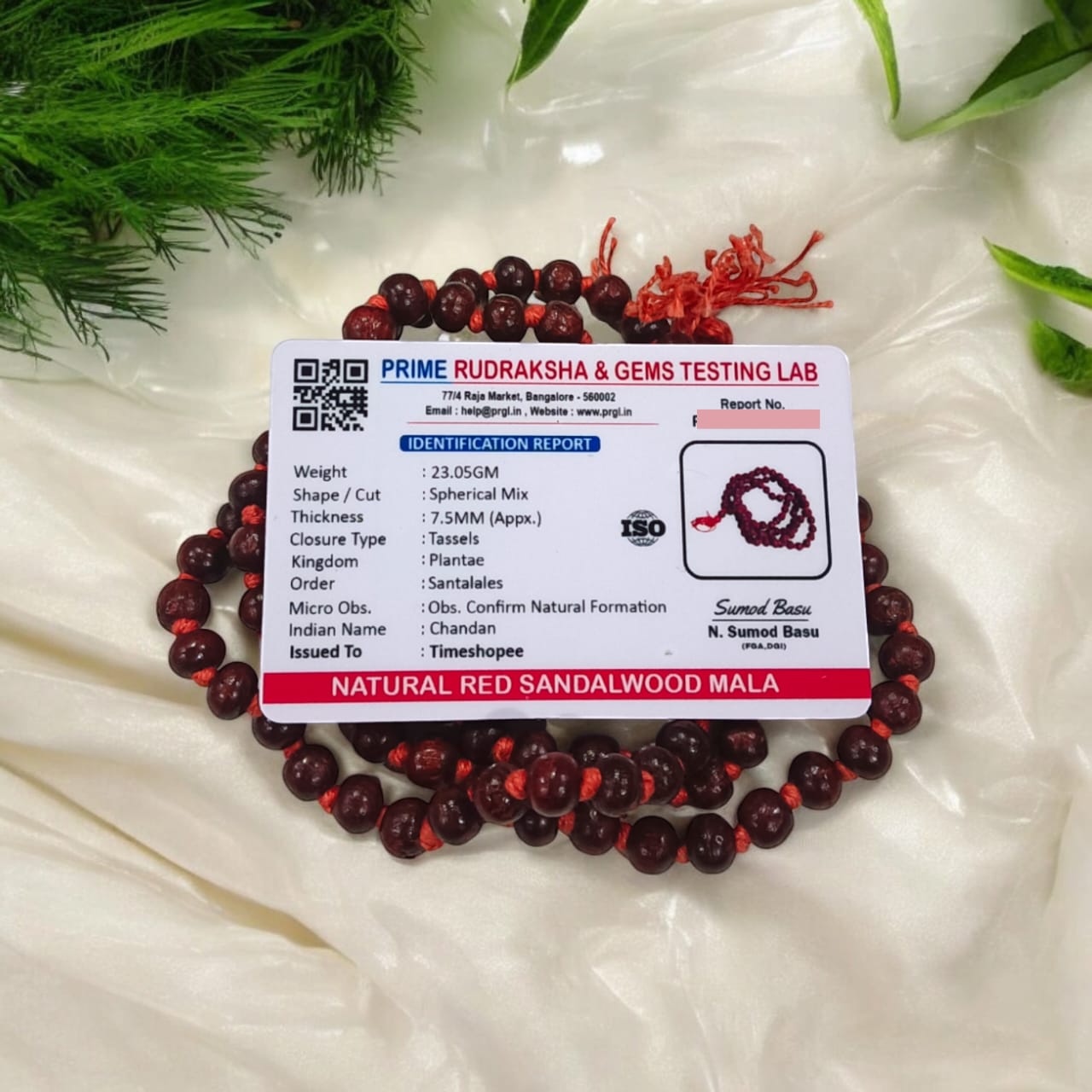 [Red Sandalwood Mala with 108 beads, handcrafted and lab-certified, placed on a white background]

