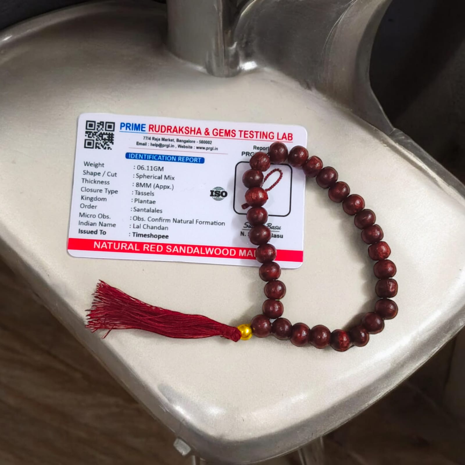 [Red Sandalwood Mala with 108 beads, handcrafted and lab-certified, placed on a white background]

