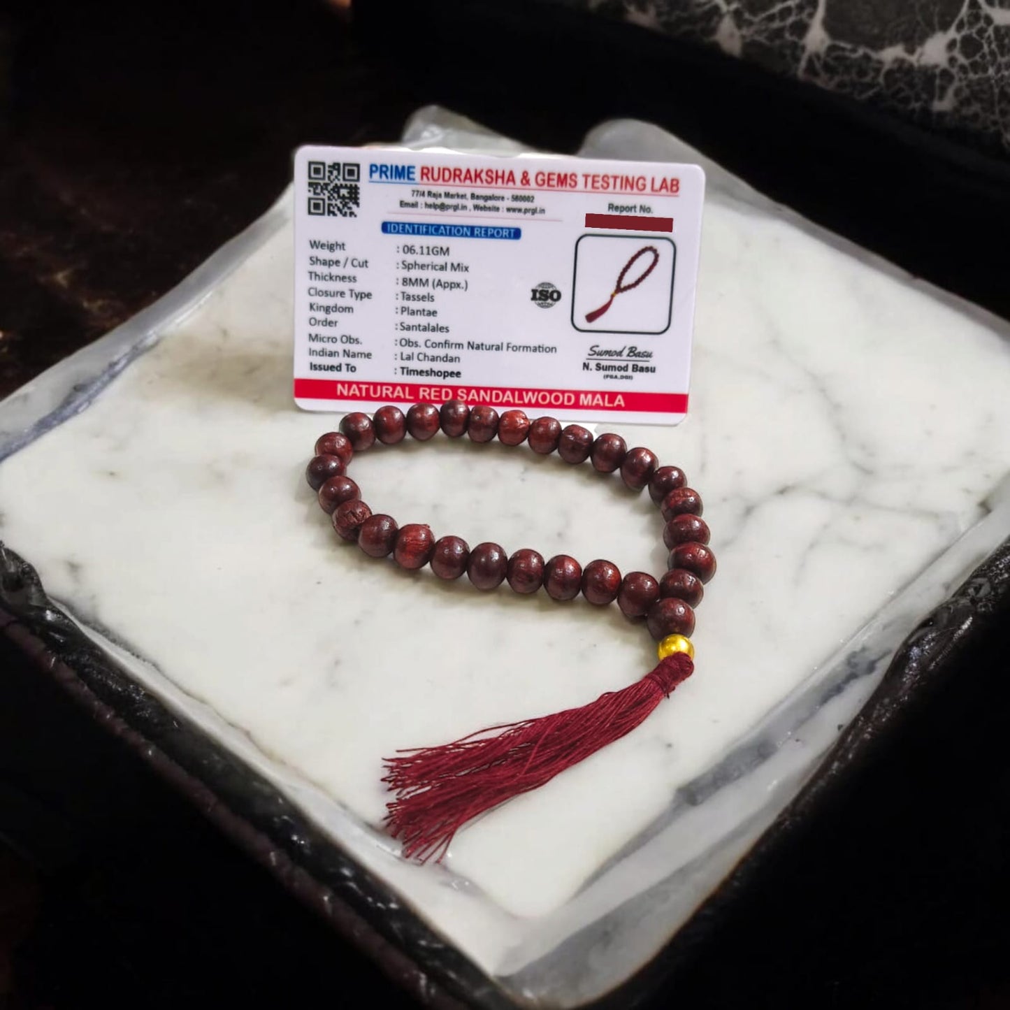 [Red Sandalwood Mala with 108 beads, handcrafted and lab-certified, placed on a white background]


