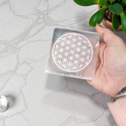 Selenite Crystal Charging Plate engraved with Flower of Life for crystal cleansing, recharging, meditation, and energy work