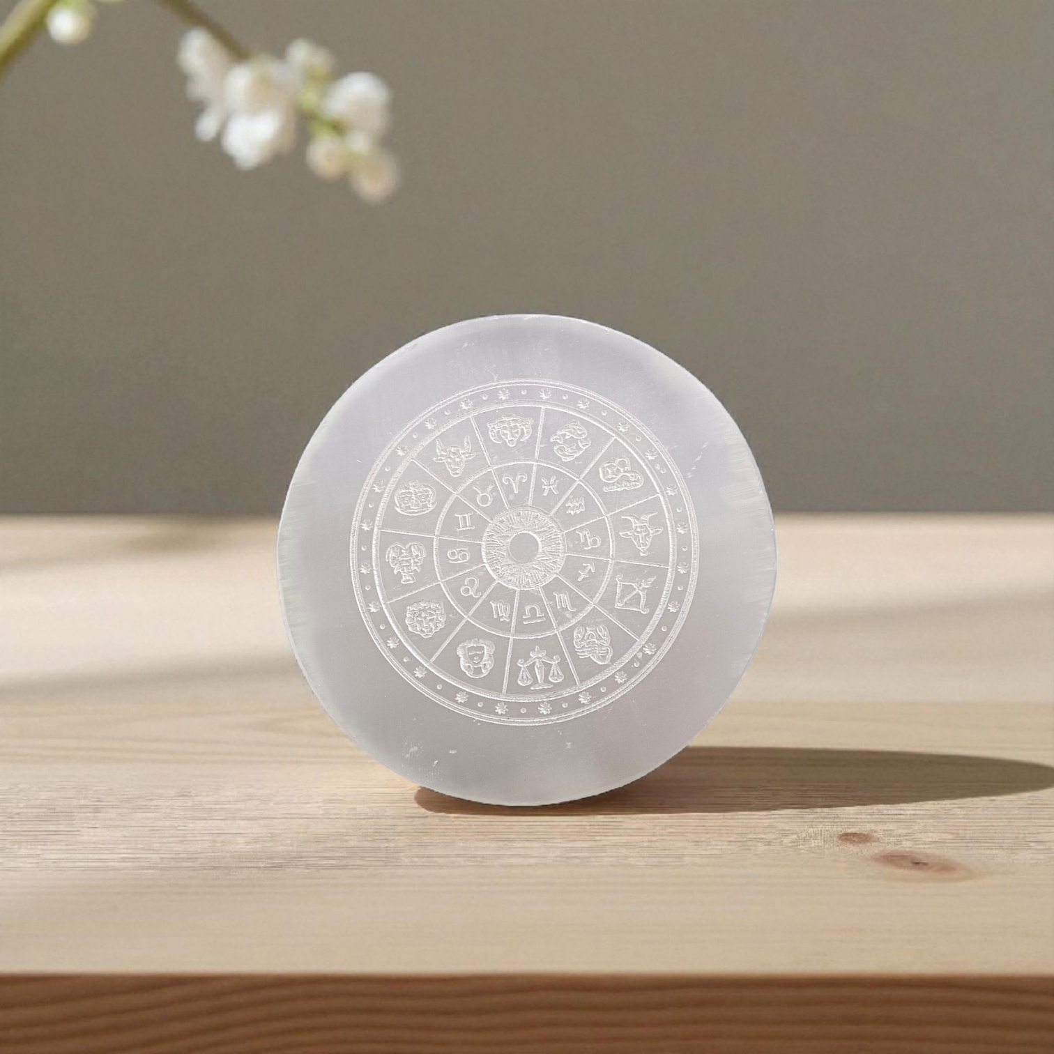 Selenite Crystal Charging Plate with engraved Zodiac signs used for crystal cleansing and healing rituals