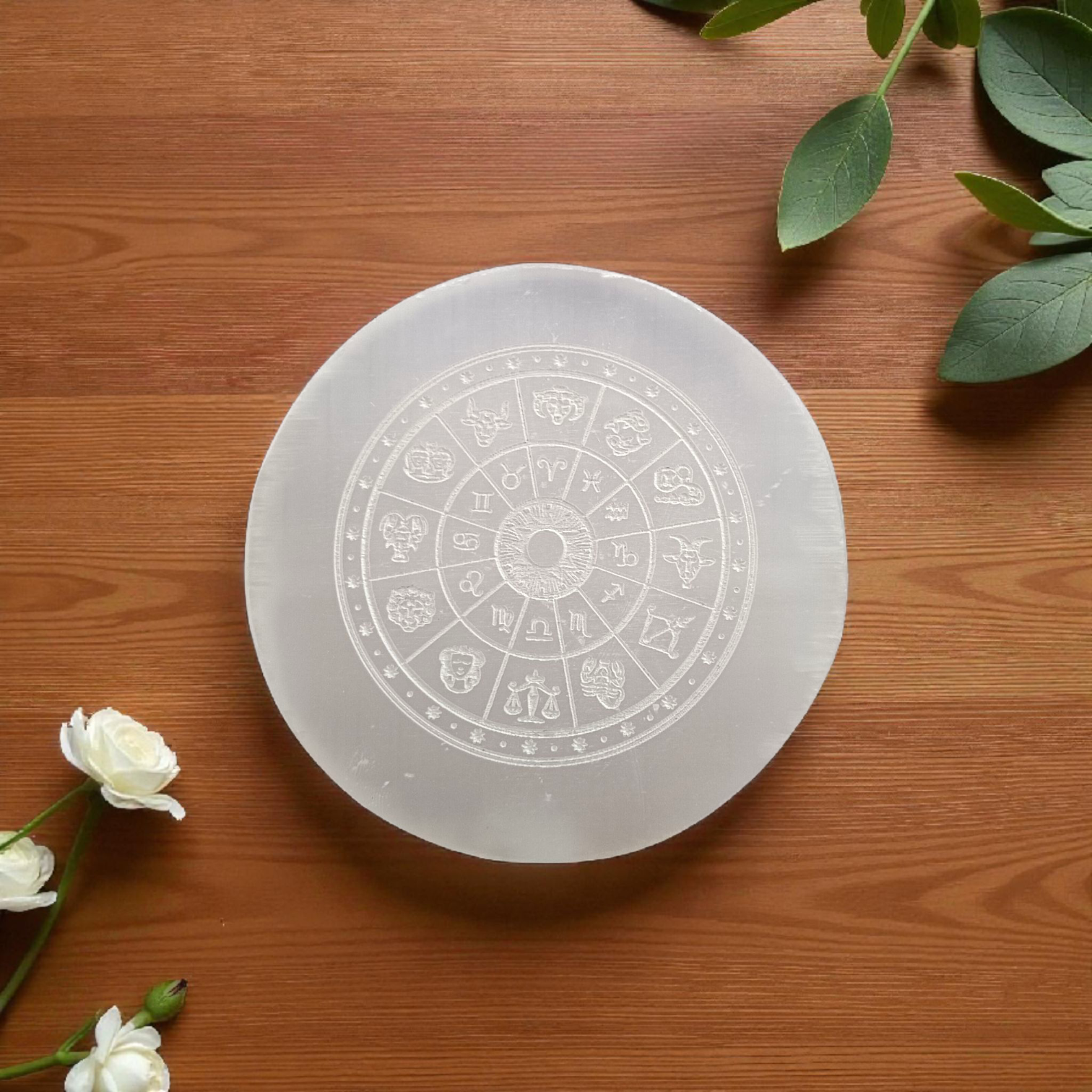 Selenite Crystal Charging Plate with engraved Zodiac signs used for crystal cleansing and healing rituals
