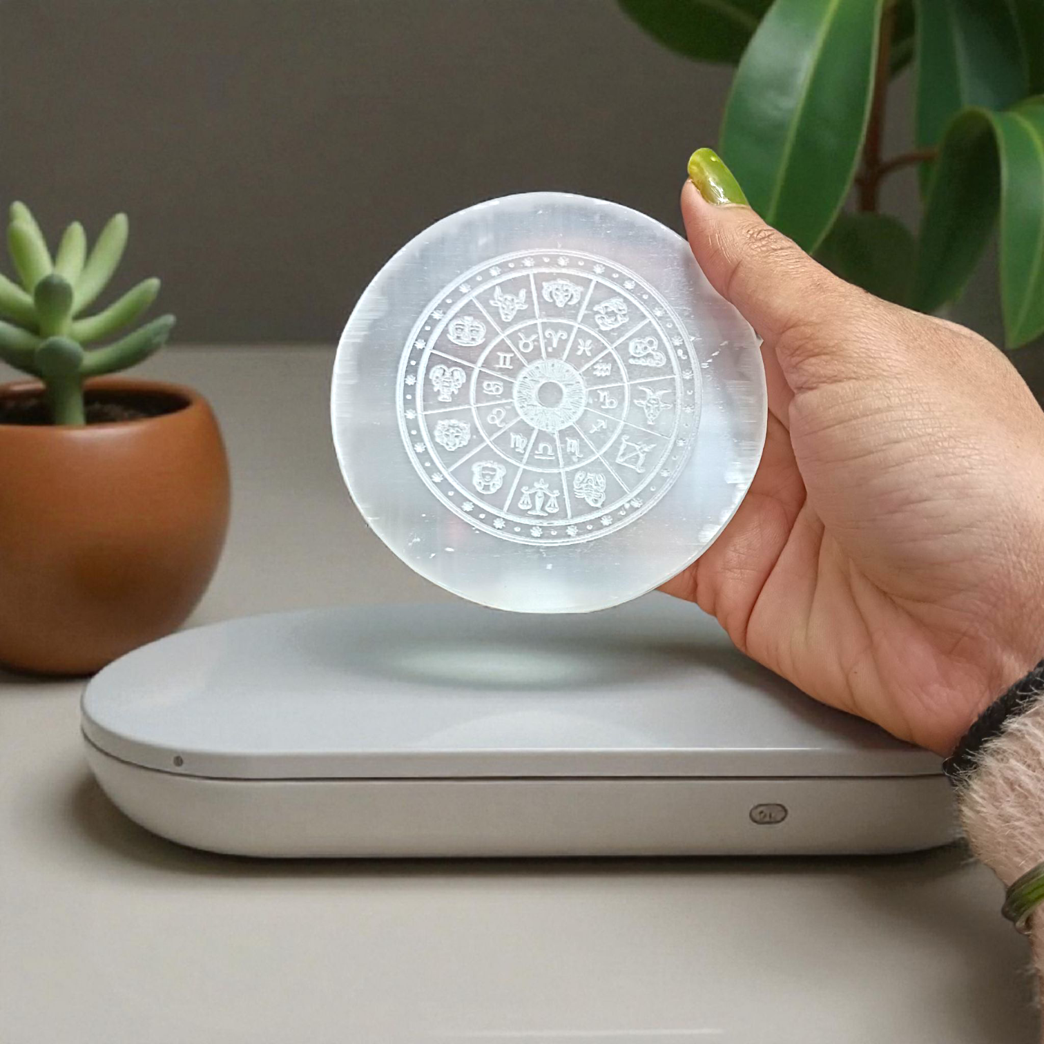 Selenite Crystal Charging Plate with engraved Zodiac signs used for crystal cleansing and healing rituals