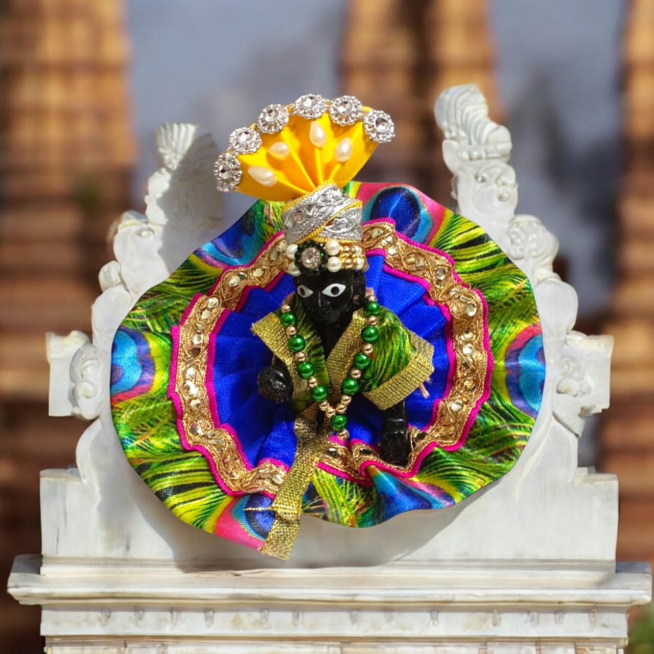 Set of 6 colorful pagdis for Laddu Gopal Size 0 No., perfect devotional headwear in vibrant red, yellow, blue, green, pink, and orange.
