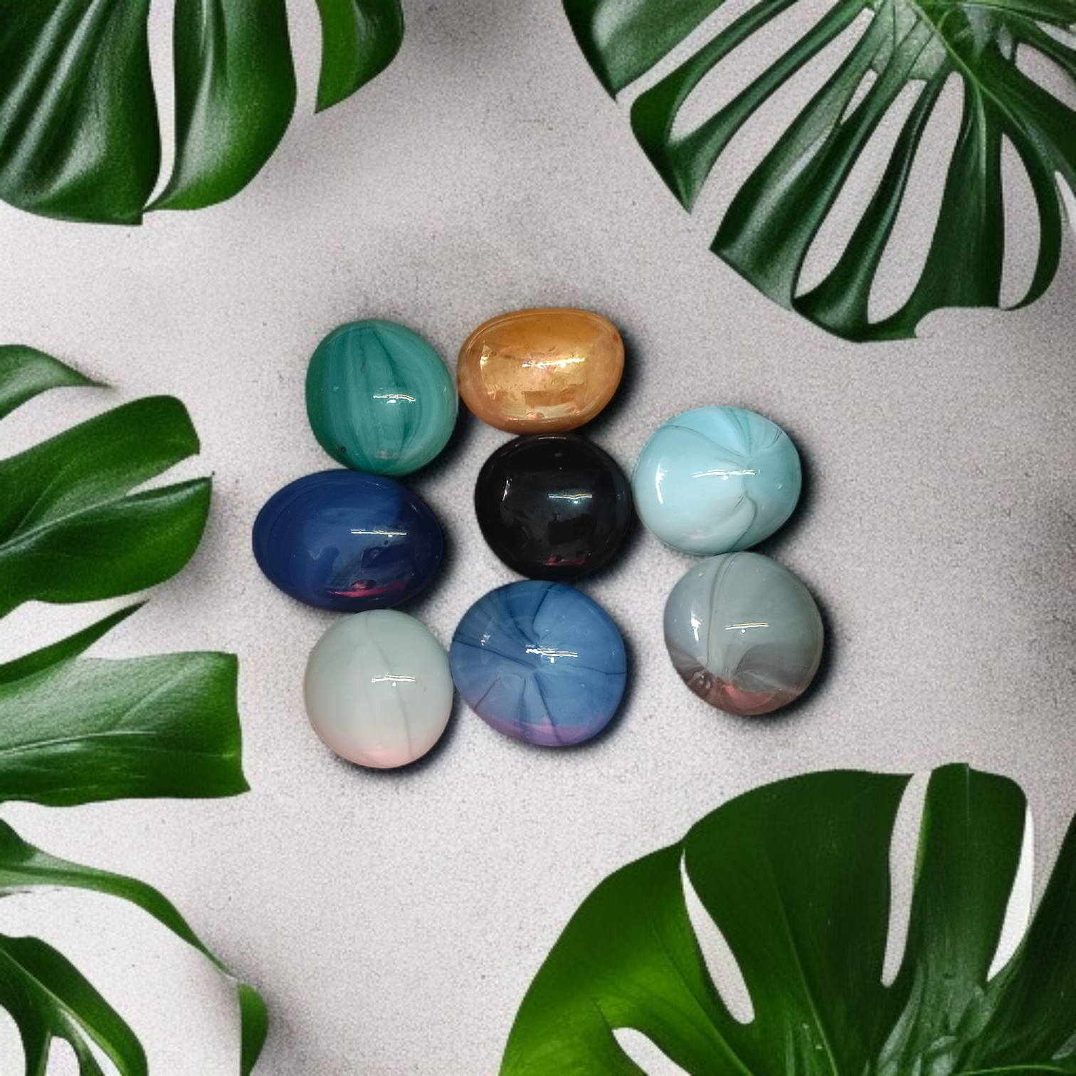 Set of 8 colorful round shiny glass pebble stones, ideal for decoration in plant pots, aquariums, vases, and home gardens