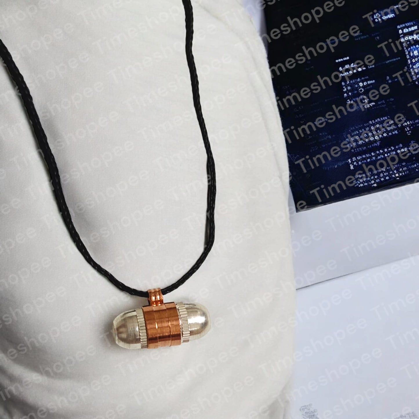 Set of Pure Copper and Silver taweezes with a Bhojpatra sheet, displayed elegantly