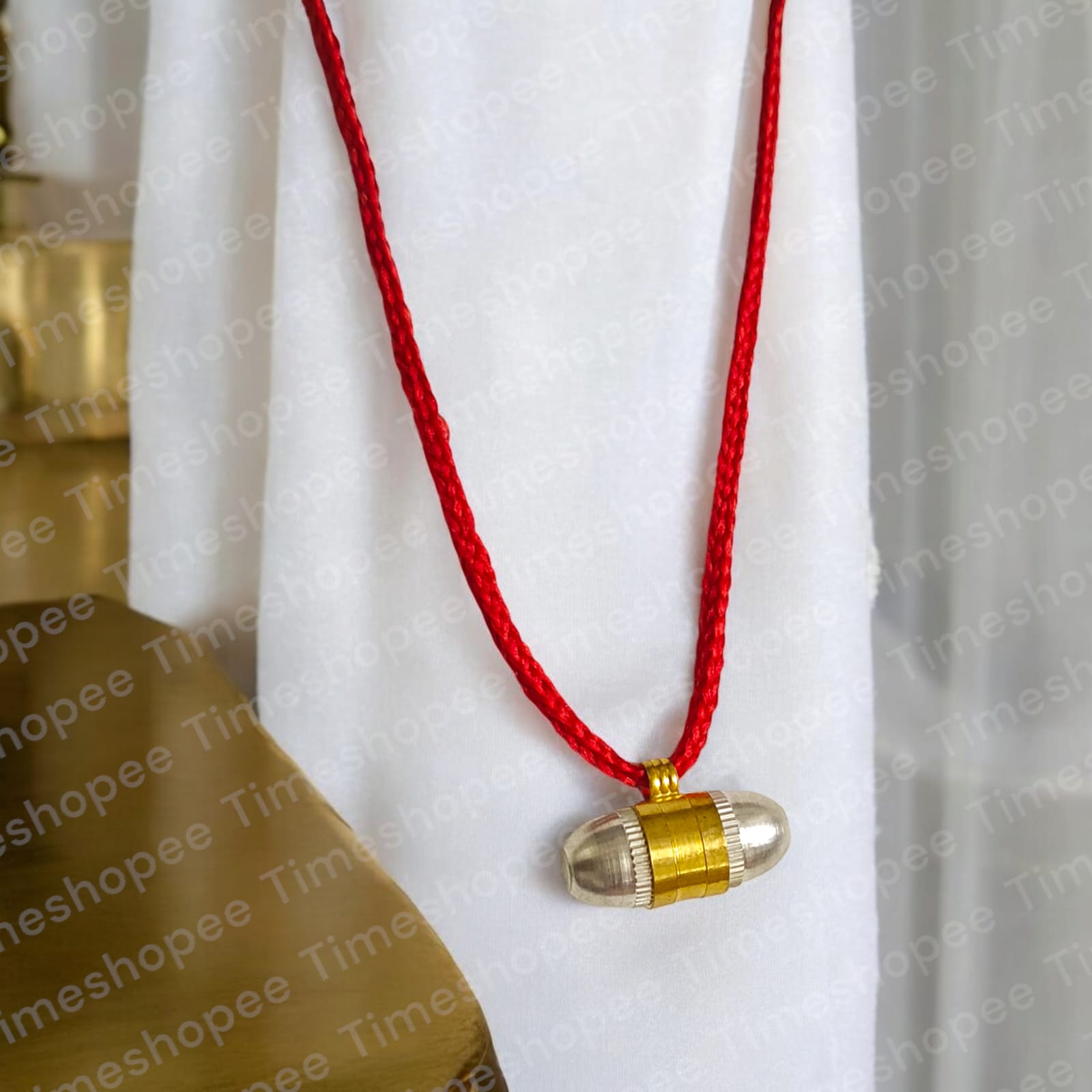 Set of five Pure Brass and Silver Metal Taweez amulets, 22mm each, with a free Bhojpatra sheet. The taweez feature golden and silver colors and an easily openable design.