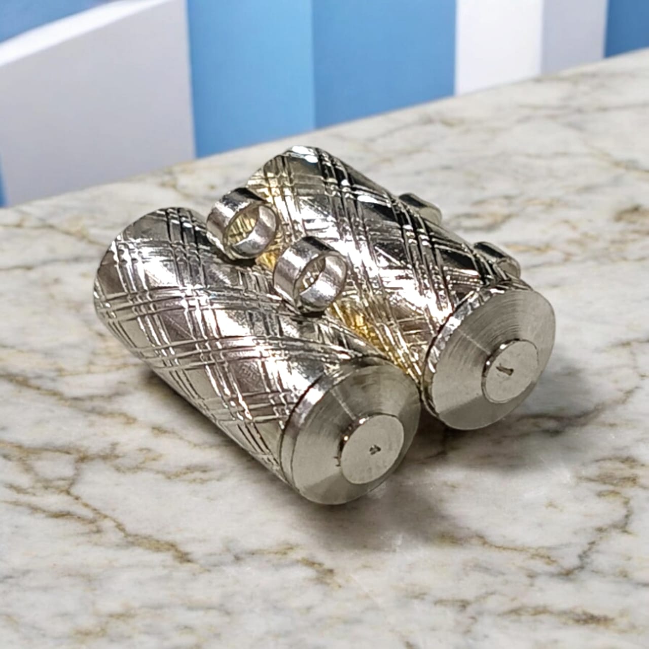 Set of five large silver metal taweez amulets, each approximately 23.3mm, with a free Bhojpatra sheet, showcasing their elegant design and spiritual significance.