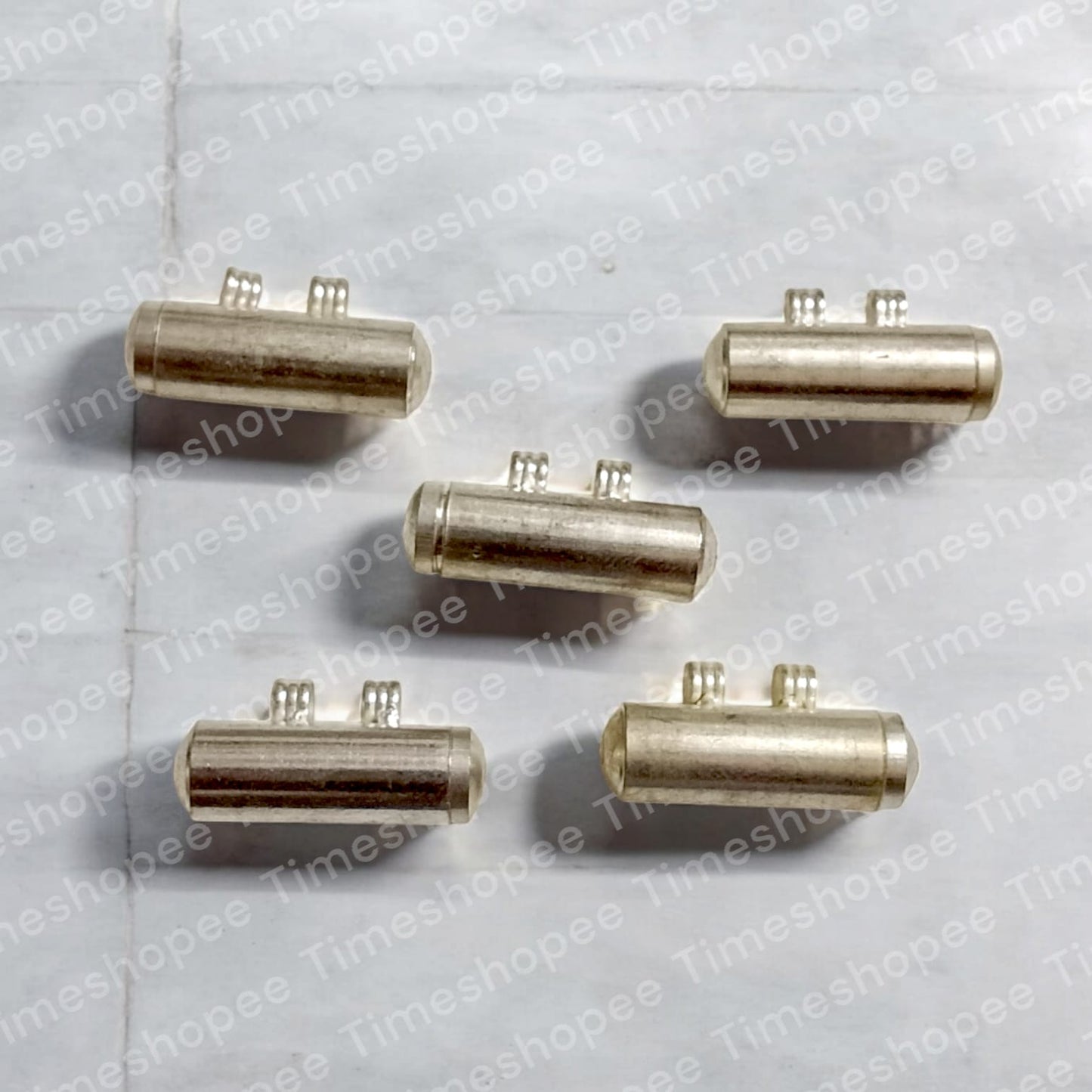 Set of five silver plated taweez amulets in silver color, available in big and small sizes, with a Bhojpatra sheet, showcasing their elegant design and spiritual significance.
