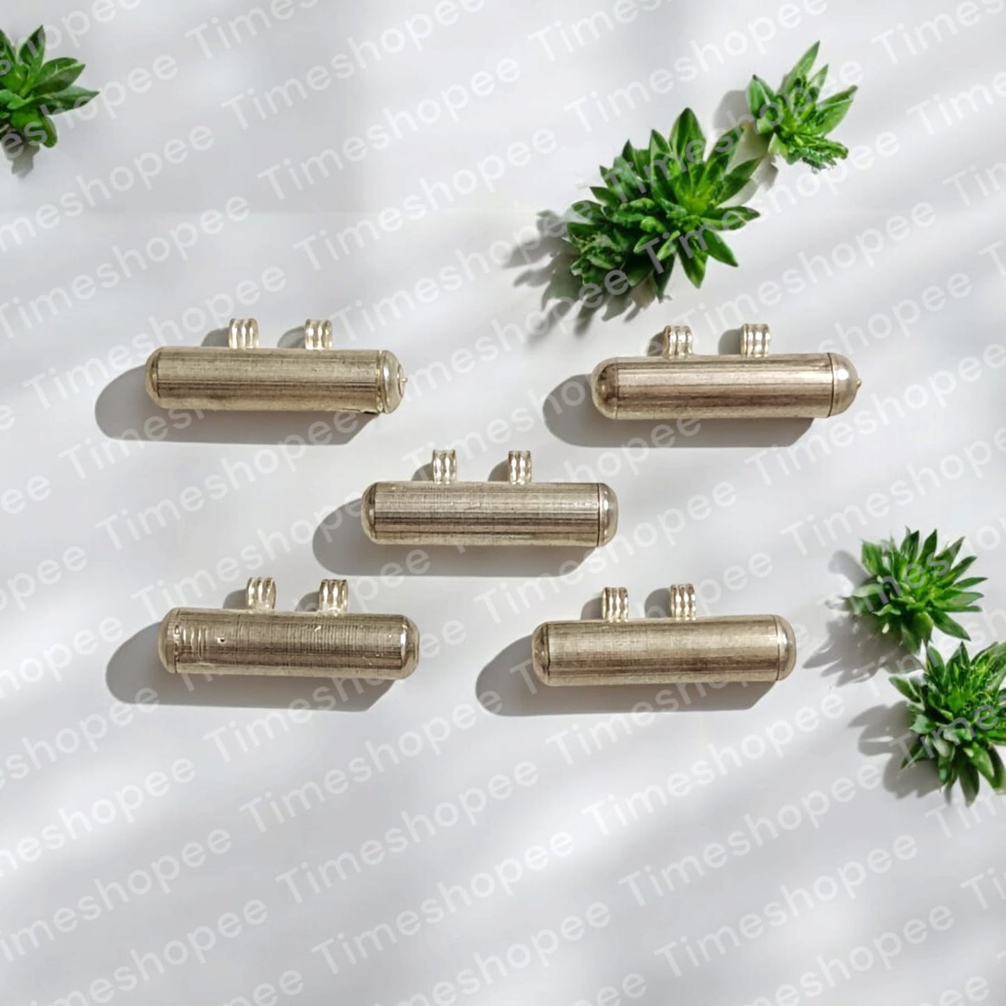 Set of five silver plated taweez amulets in silver color, available in big and small sizes, with a Bhojpatra sheet, showcasing their elegant design and spiritual significance.