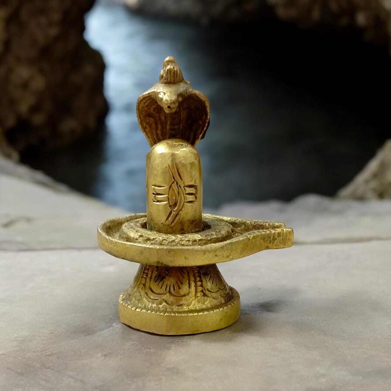 Shivling in Brass with Sheshnaag from Timeshopee, ideal for worship and spiritual decoration.