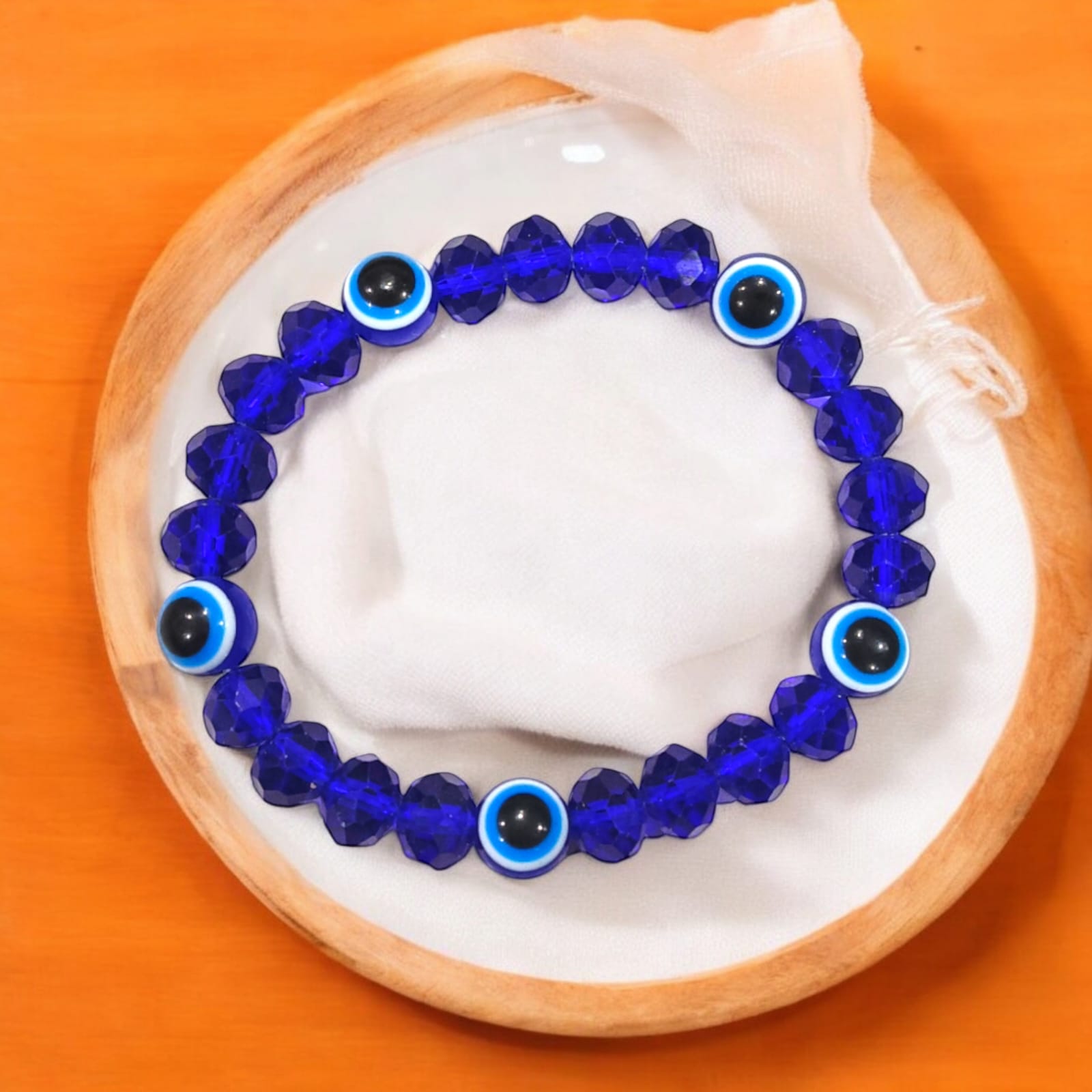 Stretchable Nazar Suraksha Bracelet with evil eye charm, designed for unisex wear.