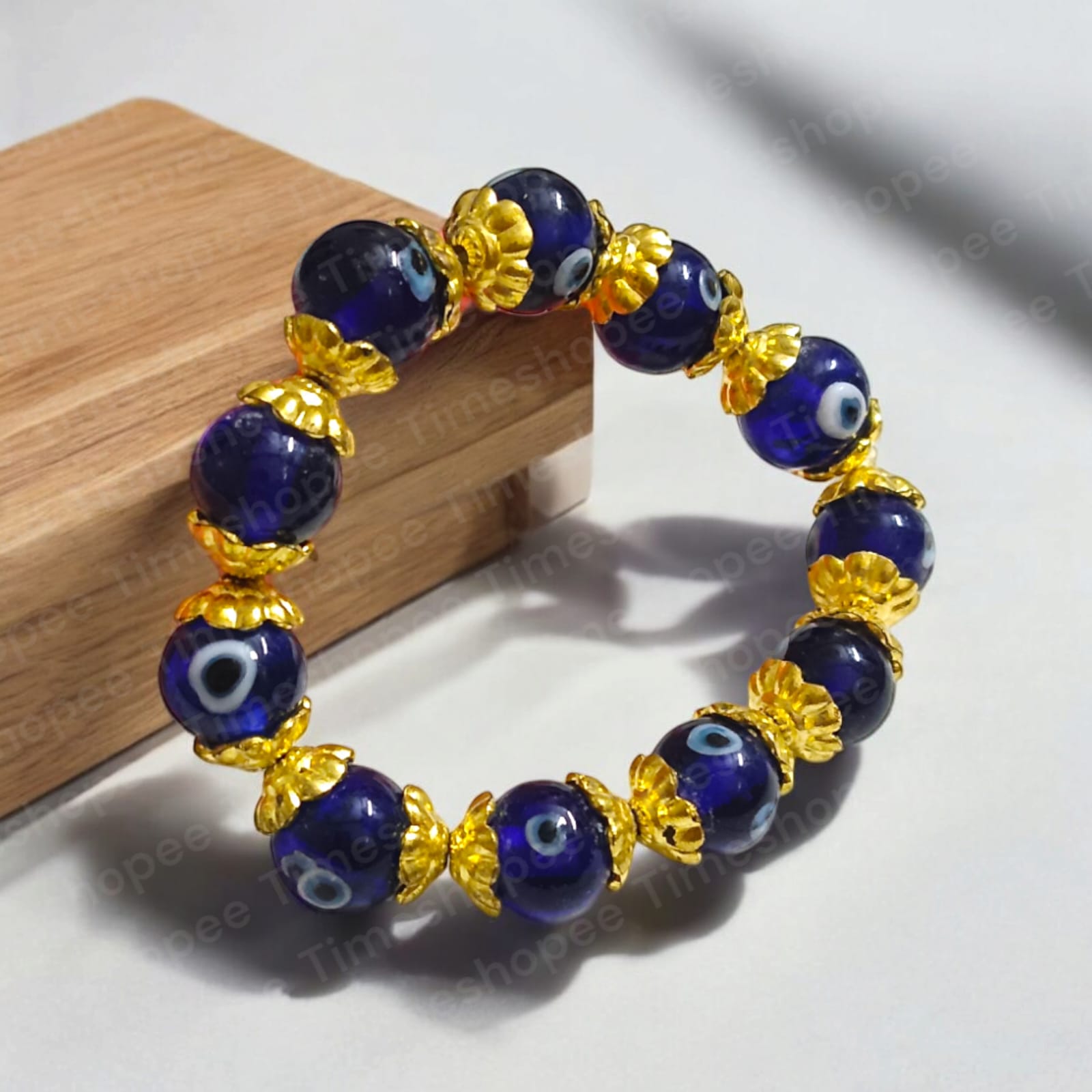 Stretchable Nazar Suraksha Bracelet with evil eye charm, designed for unisex wear.