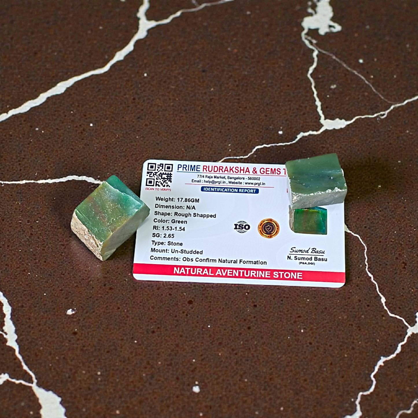 Two polished green Aventurine stones placed side by side, showcasing their smooth texture and natural crystal shine