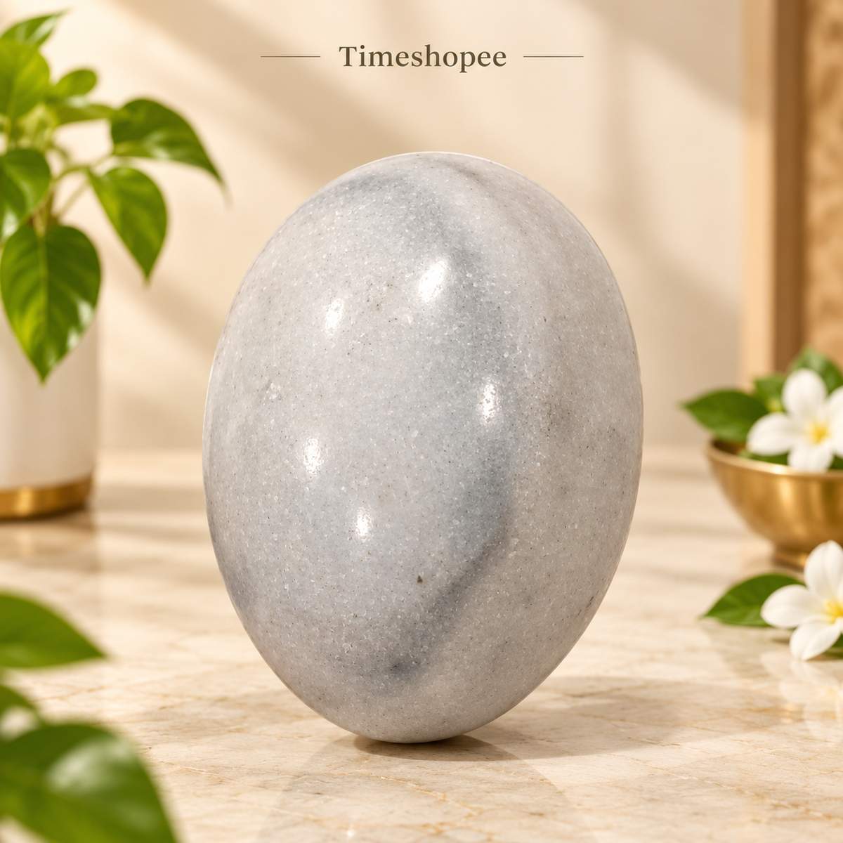White and Black Shivling Stone for Tulsi and temple worship, representing Lord Shiva with an elegant dual-tone marble design.
