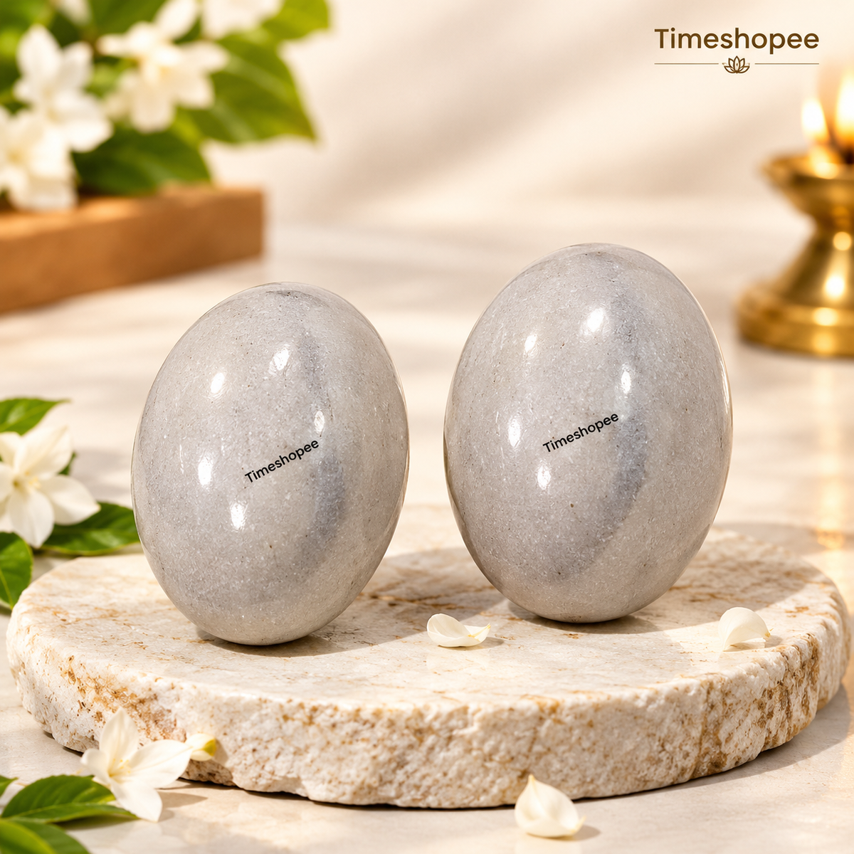 White and Black Shivling Stone for Tulsi and temple worship, representing Lord Shiva with an elegant dual-tone marble design.